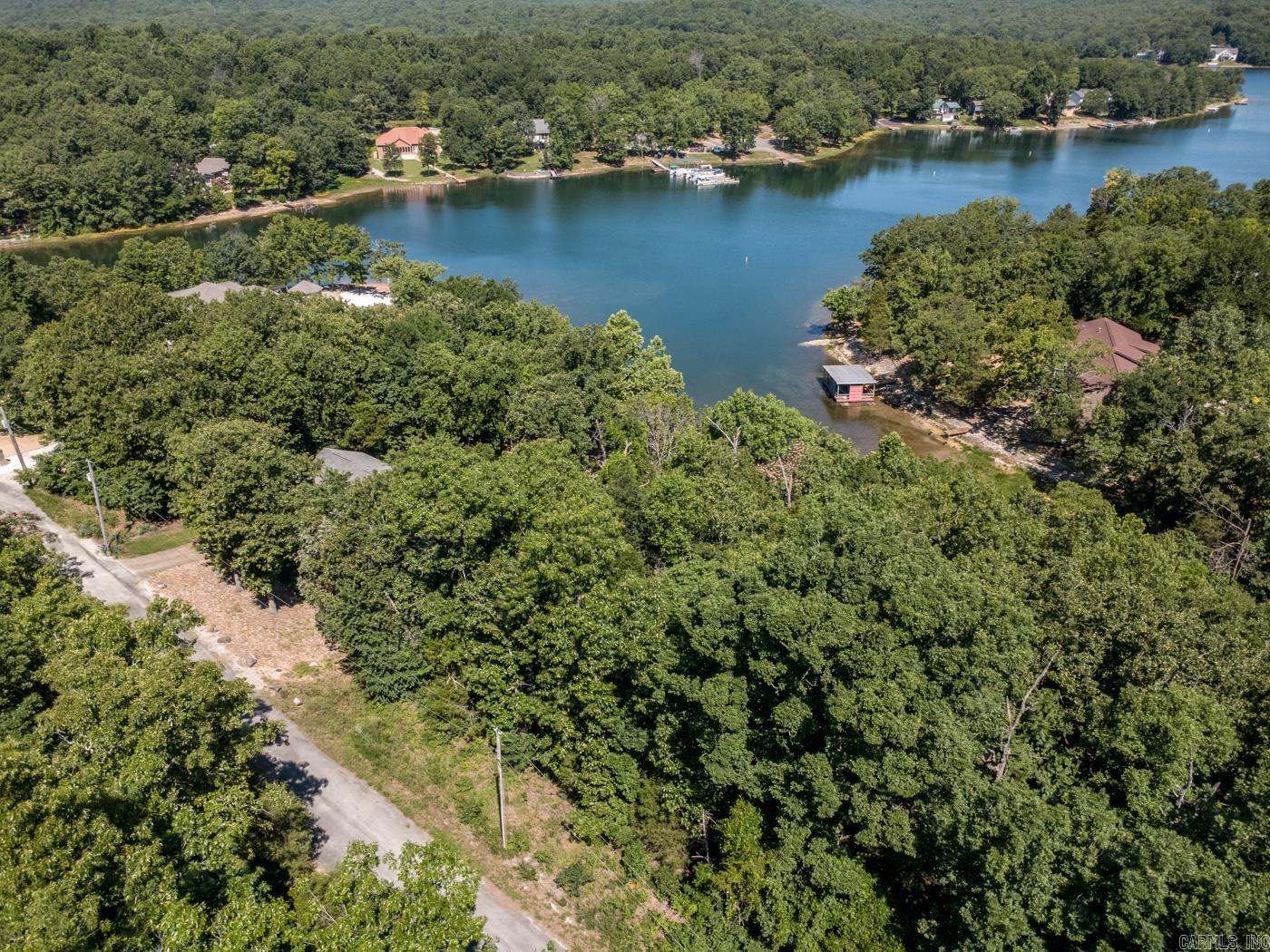 Welcome to the market this beautiful lakefront lot on Lake Omaha, in the San Ildefonso Subdivision of Cherokee Village. Enjoy all the amenities Cherokee Village has to offer, including 2 golf courses, 7 private lakes, newly constructed outdoor pools and so much more! This lot boasts 92FT of lake frontage, plenty of room for your own private dock. Call today to take advantage of this rare opportunity to make Cherokee Village your future home.