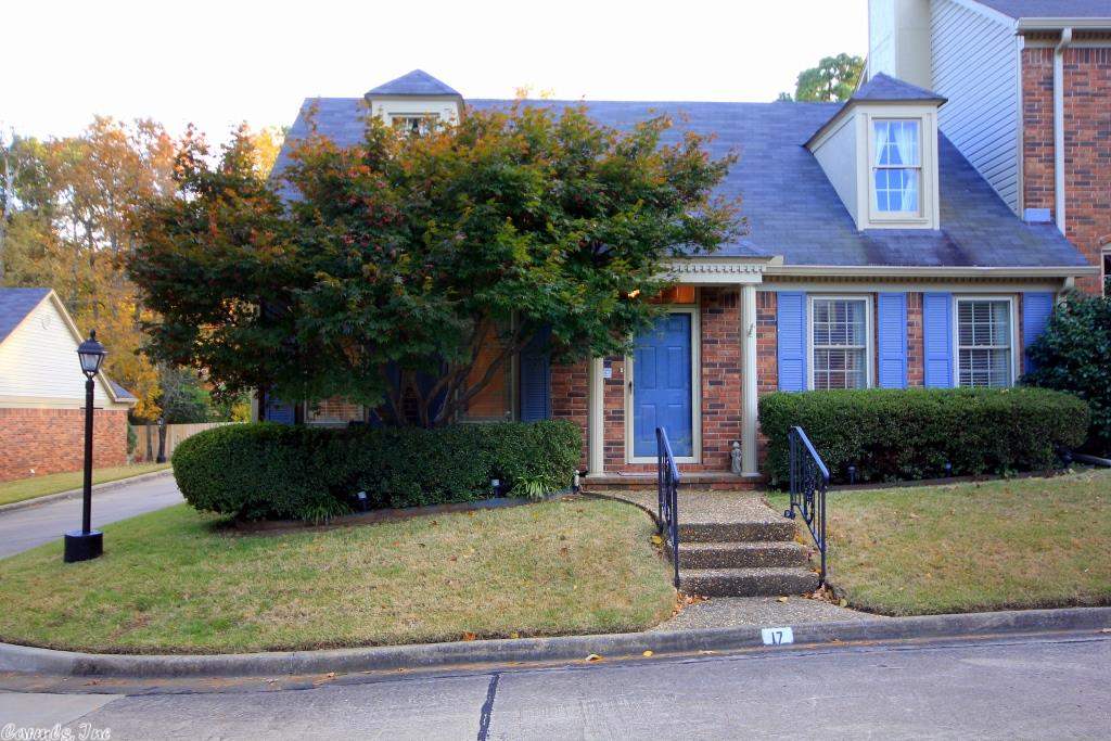 Wonderfully maintained end unit with great natural light! Spacious Living/Family Room with built-ins, vaulted ceiling and wood burning fireplace with gas logs flows into Dining Room. Great for entertaining. Office. Den. Updated Kitchen with corian countertops. Master and Guest bedroom on main level. Neutral paint, carpet and pretty hardwoods. Bonus room up with walk-in floored attic storage. Point Pleasant is a tucked away neighborhood conveniently located in a park-like setting. Private courtyard!