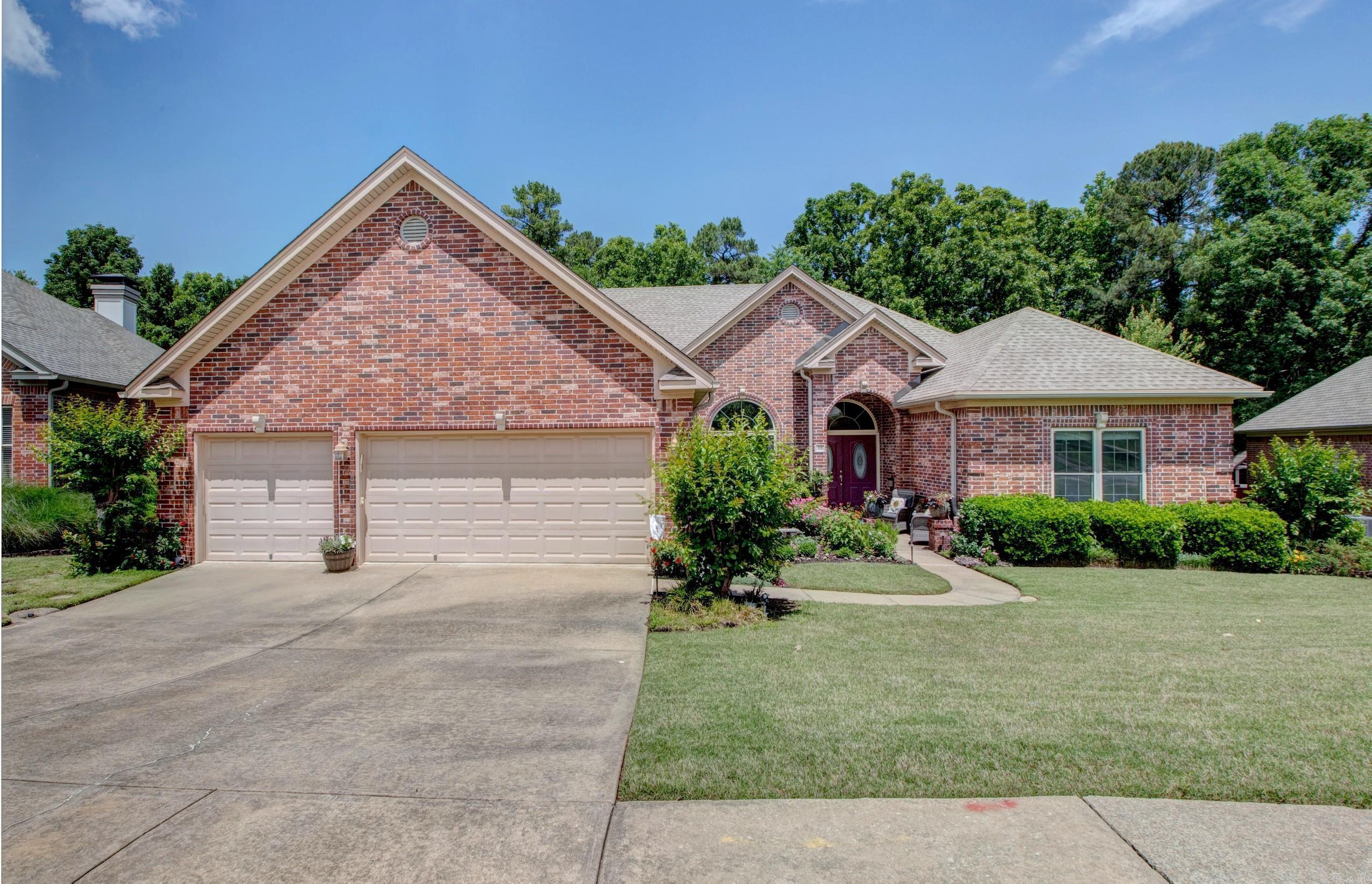 Beautiful and private, this inviting one-level Chenal home backs to an expansive protected green space that wraps around the rear of the property. The split floor plan, soaring ceilings, custom details, and spacious rooms create an open, light-filled feel. Fresh paint throughout all main living areas adds a clean, updated touch. Major updates include: roof (2017), 5-ton HVAC (2022), high-efficiency windows (2021), water heater (2018), and luxury carpet (2024). The home is generator ready, and the gasoline generator conveys for added convenience and peace of mind. A modern tornado/storm shelter in the garage provides added security during severe weather. Pride of ownership is evident throughout the home and grounds. Extensive landscaping and a full sprinkler system surround the property, while the lush backyard and multi-terrace entertaining areas are perfect for outdoor dining and gatherings. Additional insulation and a professional energy audit completed in 2021/2022 contribute to the home’s outstanding 96% efficiency rating, offering enhanced comfort and lower utility expenses.