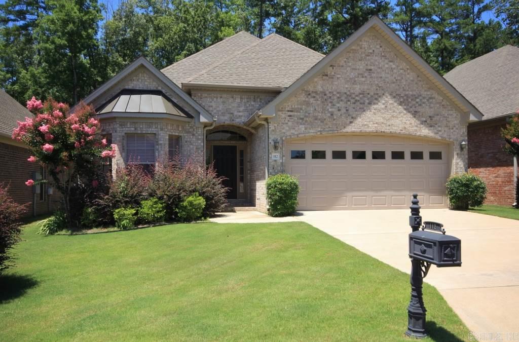 Meticulously maintained one level garden home in upscale subdivision tucked away in WLR. Custom finishes include slab granite and travertine countertops, thick crown molding and pretty hardwoods.  Master bedroom with large walk-in closet, shower and jetted tub.  Split bedroom plan.  Backs to beautiful private land.  Great storage above garage and off patio.  Wonderful location near shopping, restaurants and interstate access. $815/year tax is POA fee that pays for water sprinkler and lawn care.