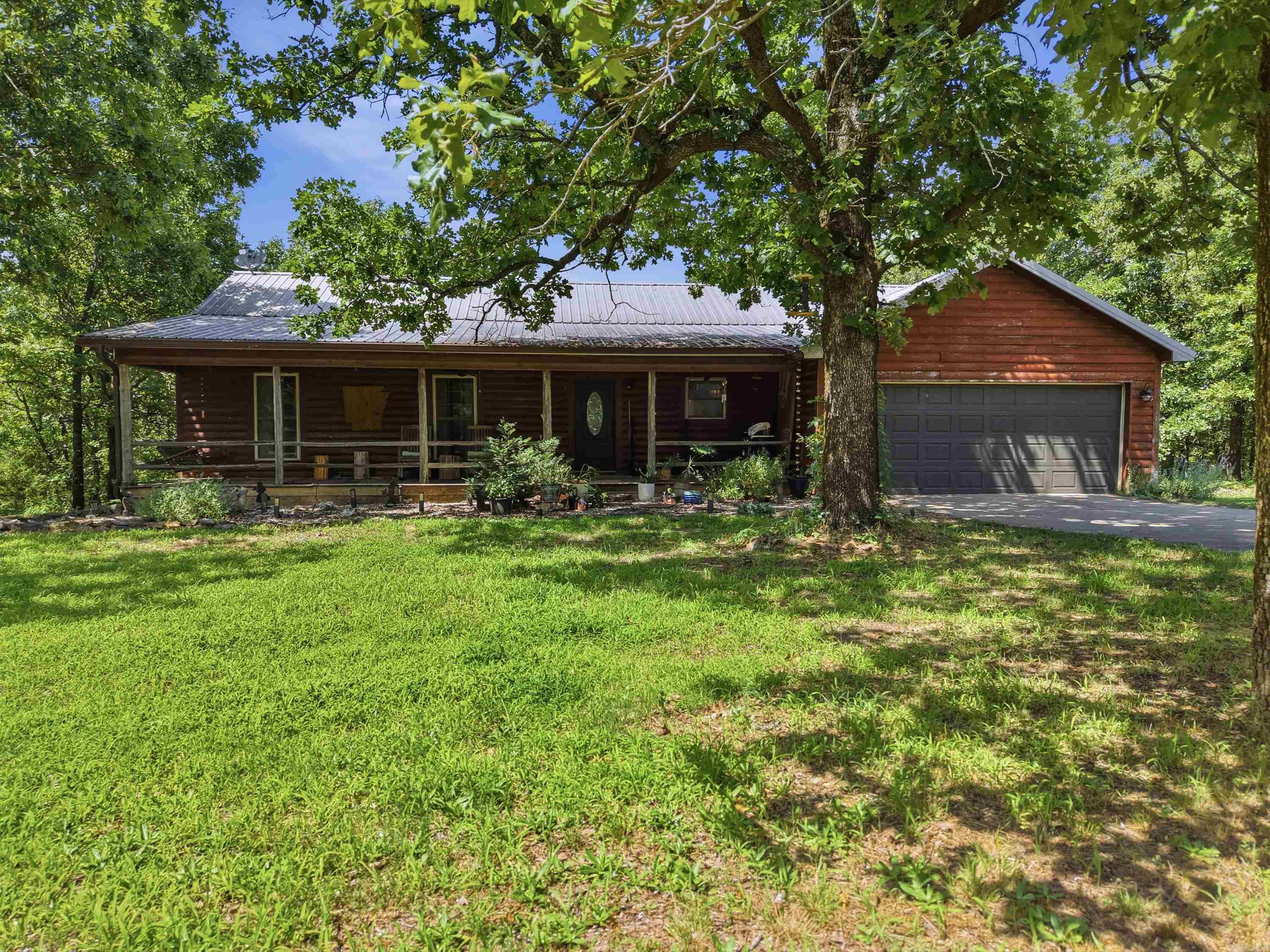 If you’ve been searching for privacy, space, and incredible views in the Vilonia area, this is the one. Sitting beautifully on 3.67 acres, this property offers a 30X36 workshop with a plumbed toilet and sink, and a quiet setting that gives privacy a new meaning while keeping you just minutes from town. The home features a spacious layout with great bones, but the absolute standout is the outdoor backdrop. The fall views from this property are truly spectacular and hard to beat. While the home is fully functional and ready for its next chapter, it needs some cosmetic updates and minor repairs to bring it back to peak condition. It is an incredible opportunity to gain instant sweat equity or customize a high-potential acreage property exactly to your taste. Bring your horses, your design ideas, and your vision to unlock everything this beautiful piece of Vilonia has to offer.  Agents, see remarks for more info.