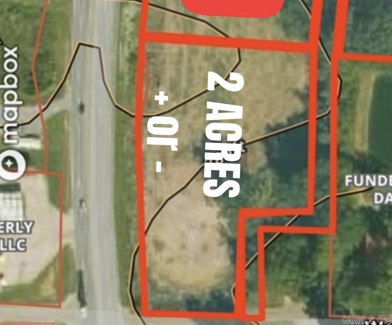 2± acres of commercial land with US Hwy frontage in a prime location. This cleared corner lot offers excellent visibility and access, with frontage on a city street and an easement in place to add utilities. Ideal for a wide range of commercial uses.