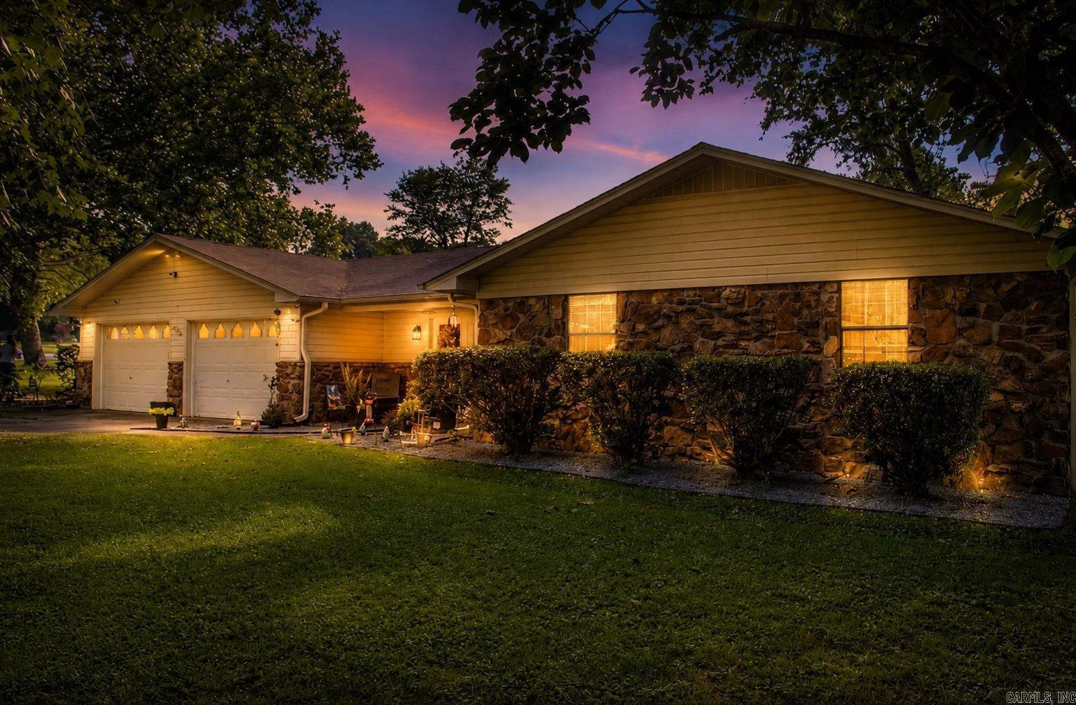 This spacious 3 bedroom home could easily be a 4 bedroom home! Lots of flex space and privacy, all nestled in a tranquil neighborhood off of Holmes Road in Searcy. Its prime location provides easy access to Hwy 16 and downtown Searcy, making it perfect for families who want to enjoy a peaceful environment while still being close to urban amenities. The bathroom was fully remodeled in 2026. The main roof is 10 years old, and the rear roof, updated more recently, is just 3 years old.  The property also includes a versatile backyard with a shop that offers great potential for various uses and is already equipped with electricity.  The spacious layout of the home, provides ample room for personal touches, allowing you to create a living environment that suits your lifestyle perfectly. Ready to explore this fantastic opportunity? Let's go check it out today!