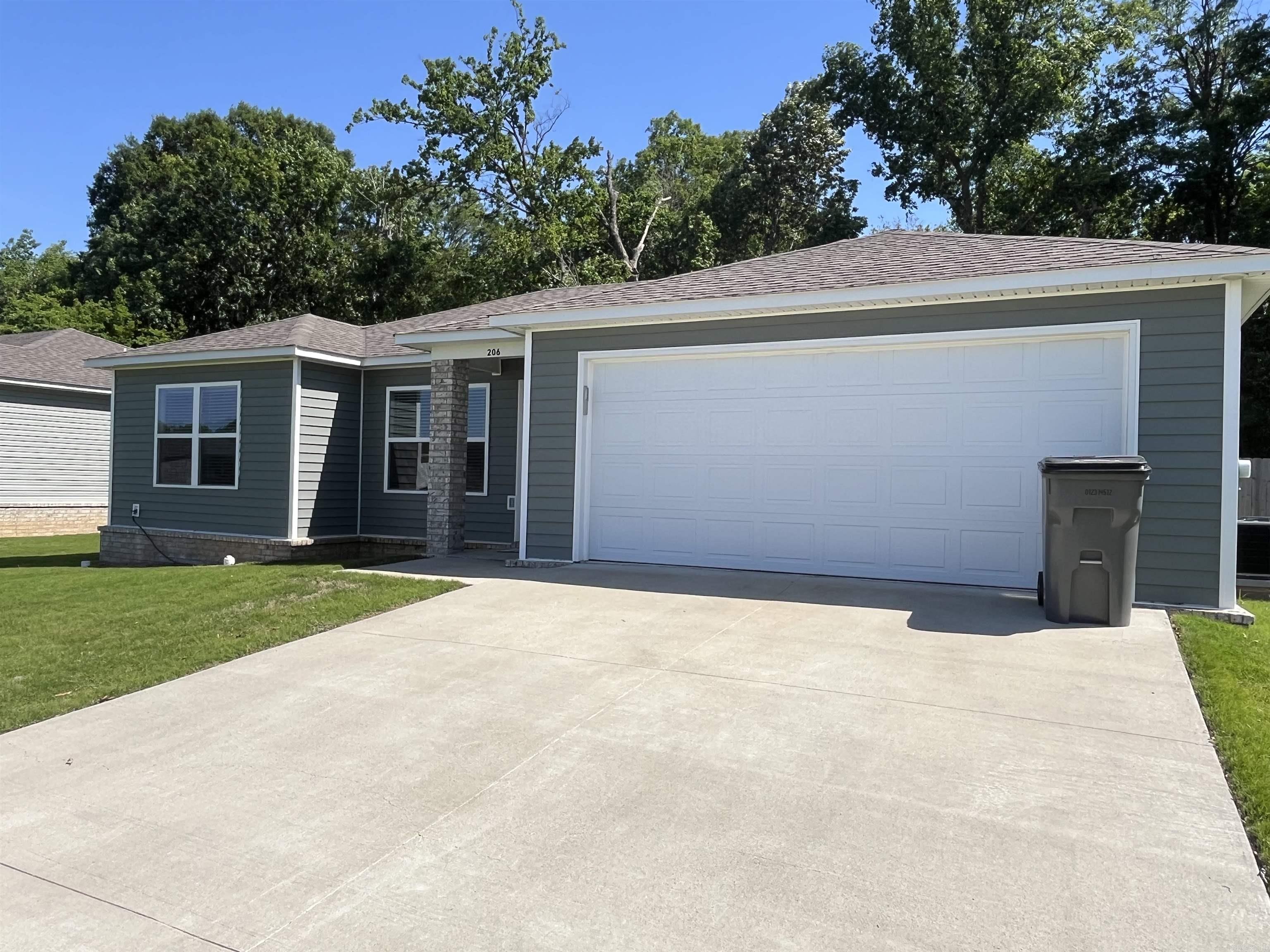 Very well maintained, must see! Welcome to the market, located at 206 Formon Drive in Paragould, Arkansas, this 2024-built, all-electric home offers three comfortable bedrooms and two full bathrooms. The home features easy-to- maintain luxury plank vinyl flooring throughout. The primary suite includes a double vanity with large walk-in closet. There is a dedicated laundry room for your convenience. Outside, you'll enjoy a new screened, covered patio and a new composite deck--perfect for outdoor gatherings. It's a well-, move-in-ready home in a great neighborhood. Call to setup a showing on this beautiful home today.