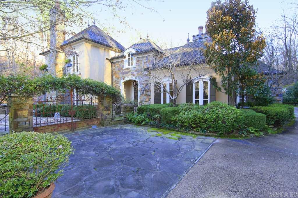 Fabulous French Country home in Ferndale. Gated entry with scenic drive right to the front door. Beautiful pond. Very private and pretty during all seasons!