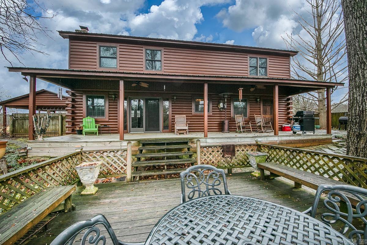This fully furnished log home is a perfect for a family get away or airbnb. This two bedroom with a loft is beautiful. Open floor plan has a big kitchen and family room. Big bedroom downstairs, loft and Master bedroom upstairs. Two big bathrooms with a great laundry/mudroom. All of this and it is on the river! Sit on the deck with your coffee and watch the wild life. The dock is great for your boat and fishing! Go out first thing in the morning and catch your breakfast! This is the place! Call today!