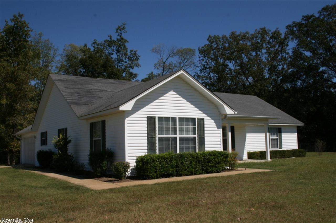 Great 3 bedroom, 2 bath home with a country feel, but oh so close to Conway.  It sets on a knoll with a serene view as you look through the living room window.  Large living area.  The master bedroom has a sitting are off of it that could be a 4th bedroom or a game room.  This home has a split bedroom plan.  All the bedrooms are nice size.  Has an apx. 8 x 10 storage building. Great Shop 30 x 54 Has electric. See mls 10365735 Home only w/one acre