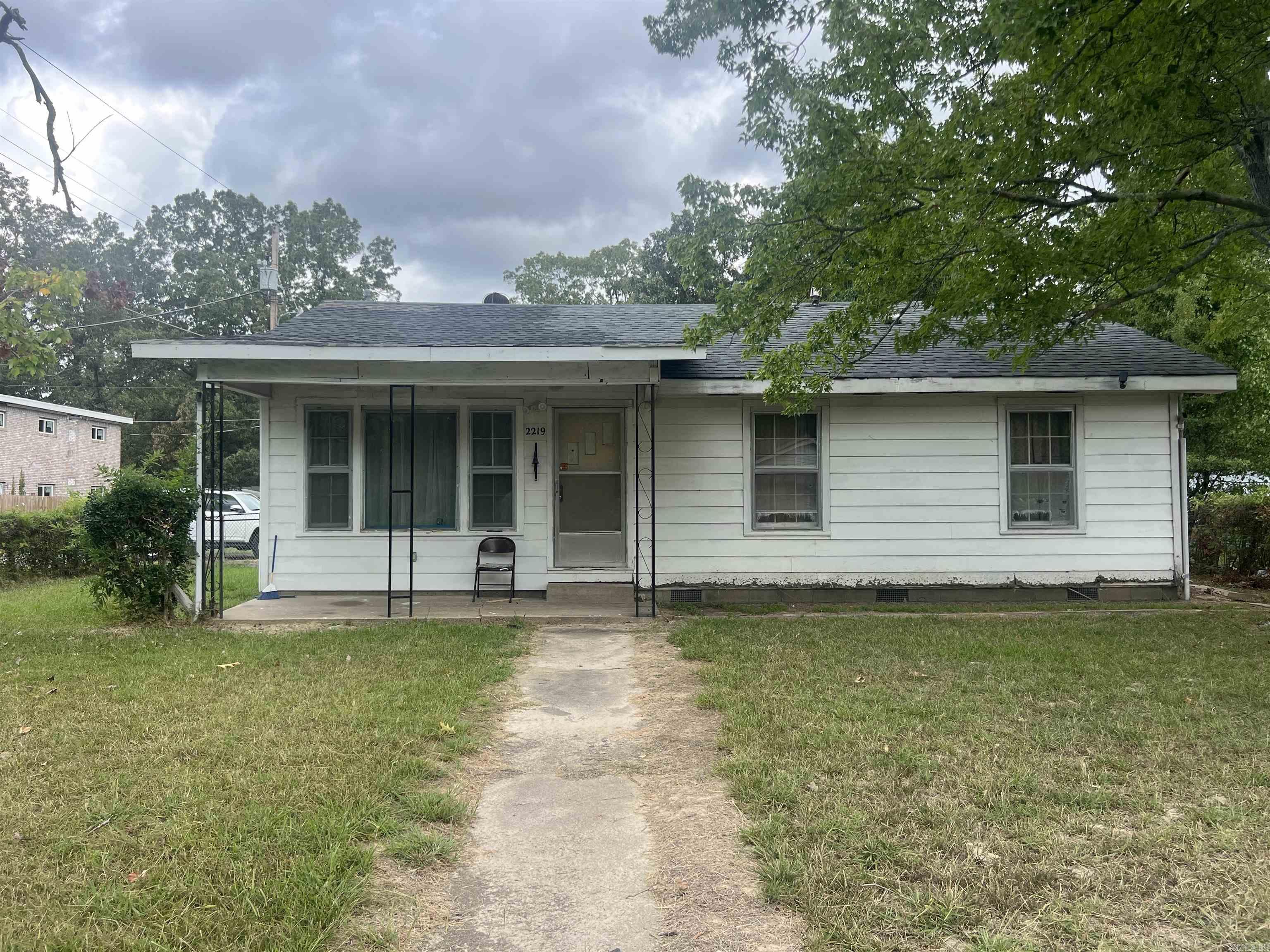 Great investment opportunity or perfect for a first time homebuyer!.  This home has three beds, two baths, large living room and dining room.  Large storage building also!