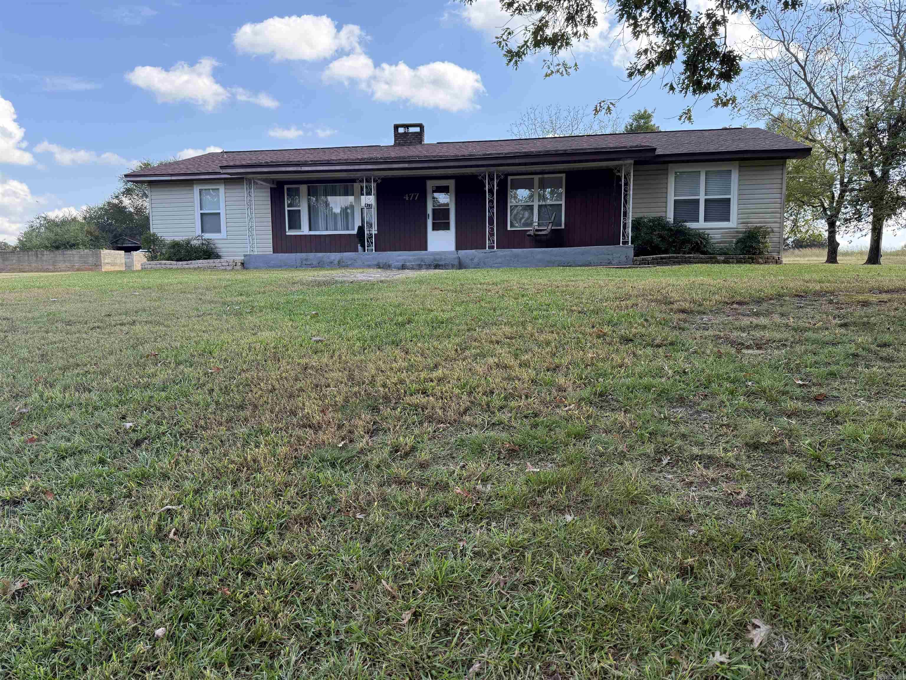 Country setting with a house and 48.50 acres pastureland, approx 11 miles east of Nashville, paved road frontage.  House offers approx 1,770 sq ft of living space, 3 bedrooms and 2 full baths. Large living room, spacious kitchen, appliances to convey, including refrigerator and stove. 12x20 storage building conveys. Home is move in ready.