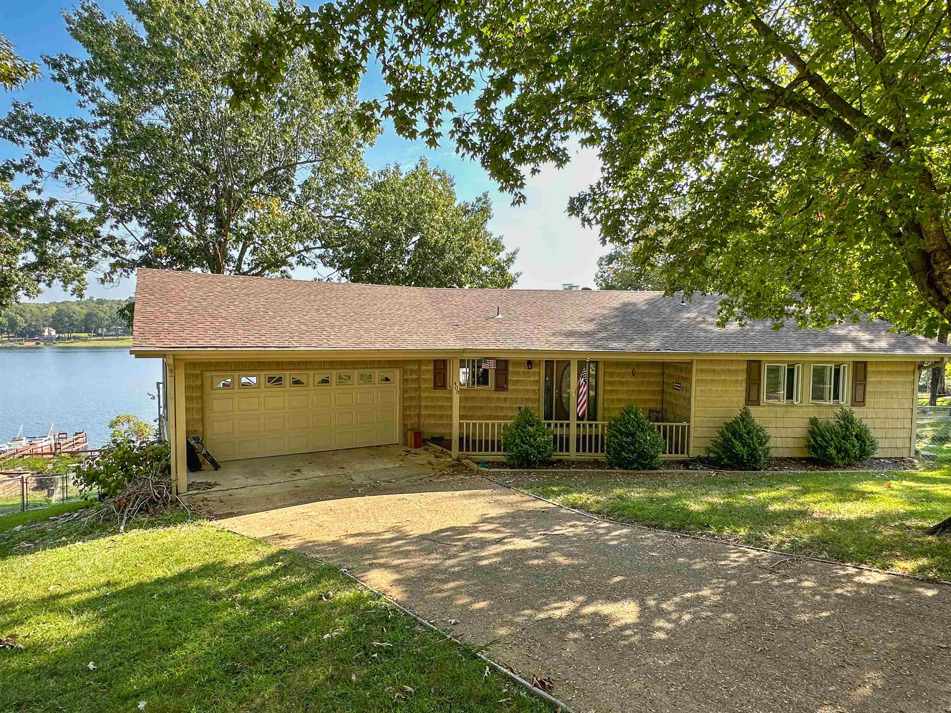 This beautiful 3 bedroom, 2 ½ bath Crown Lake Front home boasts your own private dock, approx. 100 ft of Crown Lake shore line, and gorgeous views of the 640 acre lake from multiple rooms throughout the home.   Multi-level decking provides ample entertainment space or a place to relax and unwind and enjoy the peace and serenity of lakefront living.  Nice custom wood fireplaces on both the main level and walkout basement provide warmth on a cold winter night or a back up or additional heat source.  Make an appointment to see this great property today!