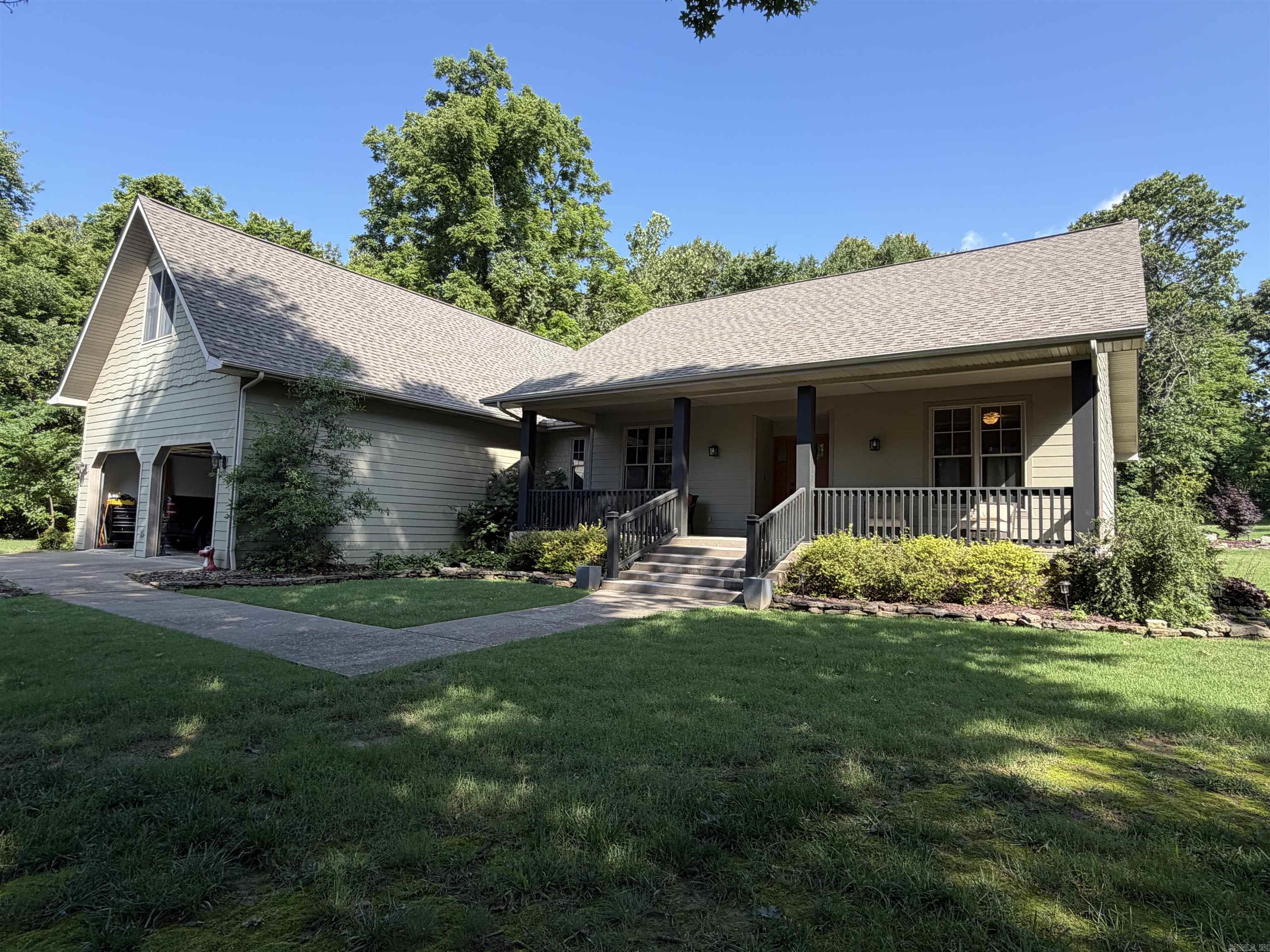 Tucked at the end of a quiet cul-de-sac, this beautifully maintained four-bedroom, three-bath home delivers the peaceful feel of country livingwithout sacrificing convenience. From the welcoming front porch to the serene back patio, every detail has been thoughtfully designed forcomfortable, low-maintenance living. Inside, rich hardwood floors anchor a spacious living room with soaring ceilings and a classic fireplace —the kind of space that feels equally at home for quiet evenings and lively gatherings. The kitchen impresses with granite countertops andgenerous room to cook and entertain. Bedrooms are well-proportioned throughout, and a versatile bonus room upstairs works perfectly as aplayroom, home office, or hobby space. The fourth bedroom and third full bath are also privately situated on the upper level, ideal for guests or ateen suite. Step outside and discover an expertly landscaped backyard that opens onto a blend of wooded tree line and open pasture! Move inready!