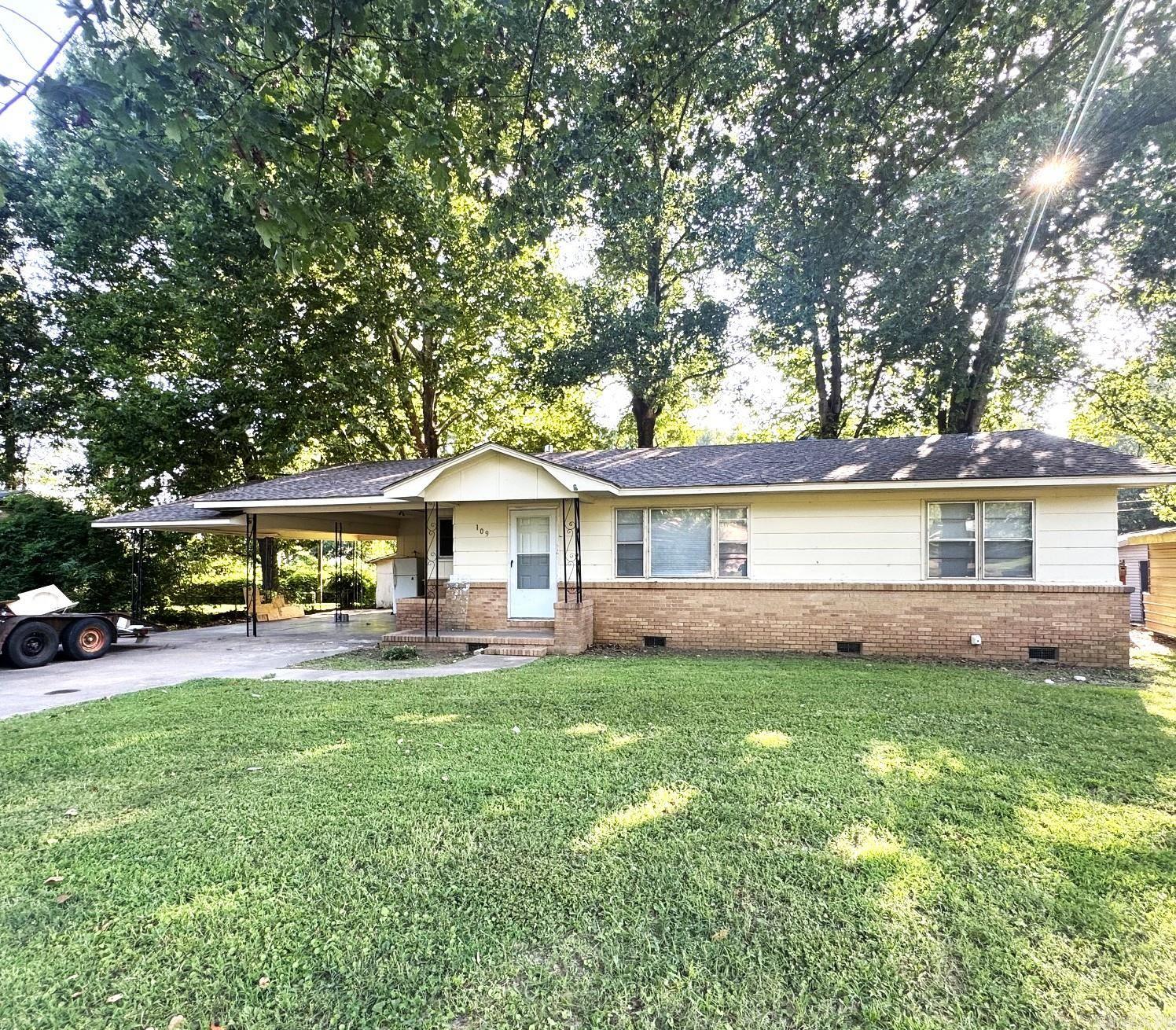 You will love this charming 3 bedroom ranch style home that's move-in ready with a spacious family room and numerous recent updates.  Enjoy peace of mind with a new roof installed in 2025, new luxury vinyl plank flooring throughout most of the home, and fresh interior paint that gives the space a bright, modern feel.  Outside, you'll find a convenient 1-car carport, an additional parking pad for extra vehicles, and a flat lot that is easy to maintain.  Whether you're a first time homebuyer, looking to downsize searching for a great investment opportunity, this well-maintained home is an excellent choice.