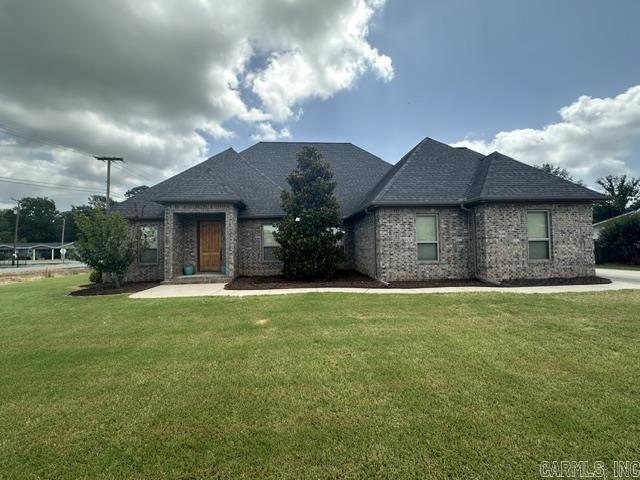 Don't let this one get away! This custom-built home offers 4 bedroom and 3 bathrooms with over 2,800 sq ft. Downstairs you'll find 3 bedrooms and 2 full baths, while the upstairs bonus room features a private bedroom and full bath - perfect for a teenager, guest suite or home office. The spacious open floor plan is ideal for entertaining. This kitchen offers abundant cabinet space, a breakfast bar & a cozy breakfast nook. The inviting living room features a wood burning fireplace, creating the gathering space. The primary suite is designed for convenience, with a large walk-in closet featuring a built-in dresser and direct access to the laundry room. The en-suite bath includes dual vanities, a large tub and a separate walk-in shower. Step outside to enjoy the covered patio overlooking the fenced backyard all situated on a desirable corner lot in a great location, the kids can walk to the schools.