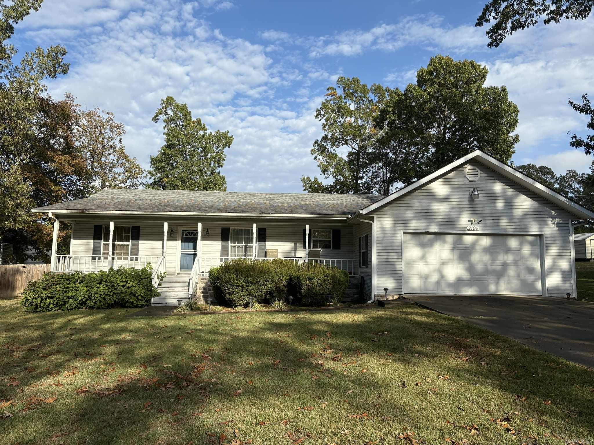 Check out this immaculate 3BR/2BA home located in a subdivision just minutes from Greers Ferry Lake, the Little Red River, shopping and dining. This move-in ready home offers an inviting floor plan with built-in wooden china cabinets, a 2-car garage with shelving, and floored attic for additional storage. The spacious fenced backyard features a deck perfect for outdoor entertaining. Ideal for a permanent residence, vacation retreat, or investment property-this home is ready to welcome it's next owner!