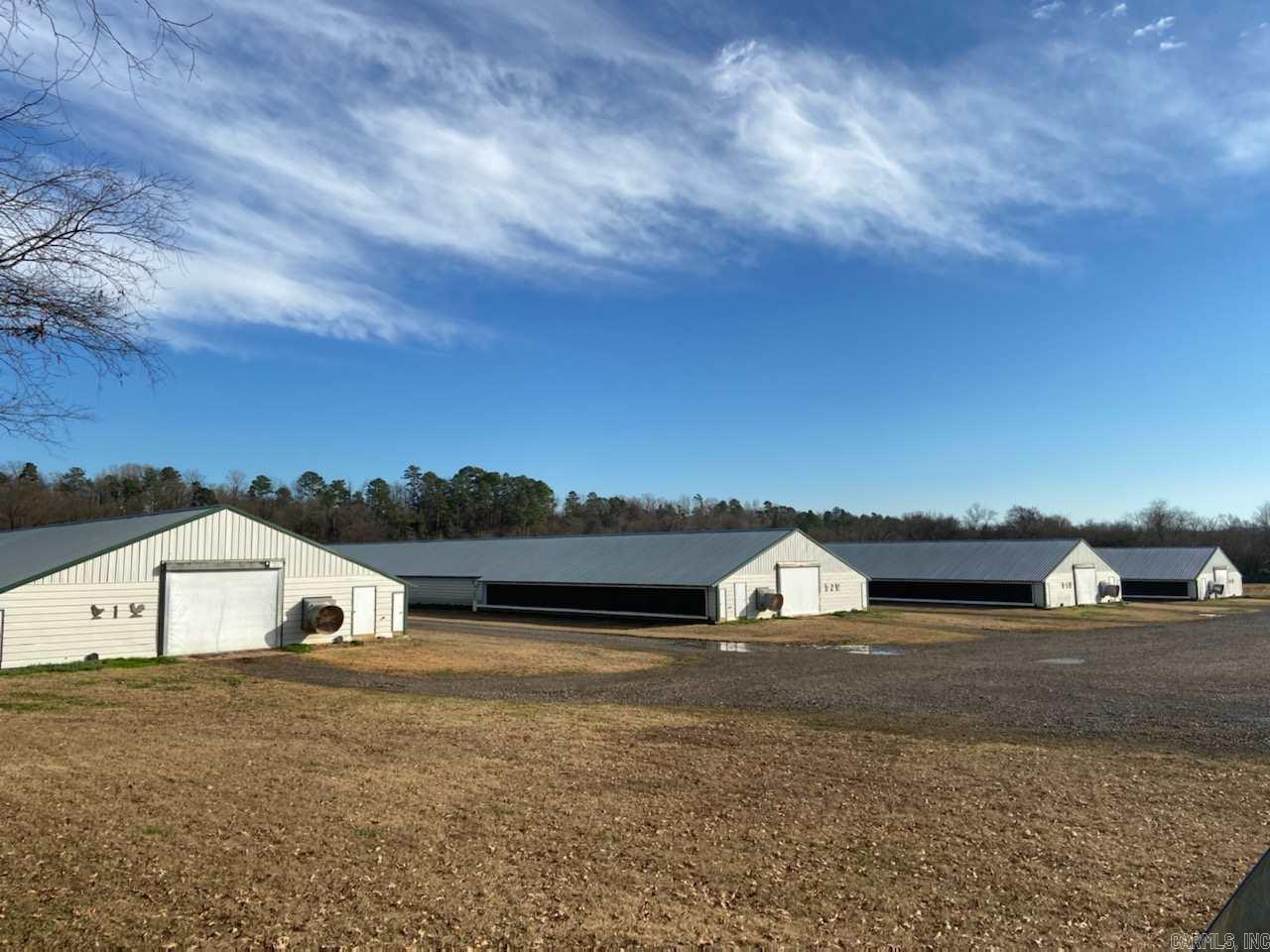 This is a top producing Broiler Farm with a very nice 40 acres Of mostly improved pasture with Robinson Creek running through the property.  Poultry houses have been updated and are in very good condition. Poultry Houses are 43 X 500, Composter and Litter Shed.  2 Water Wells and Rural Water supply water to this Farm.  Lots of really nice Pasture with good fencing.