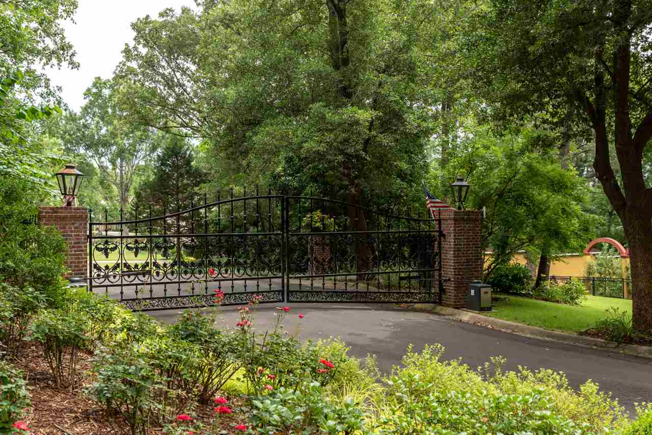 Located in the heart of Mid-Town, this exquisitely remodeled, estate encompasses 4.47 acres of magnificently landscaped grounds. This home combines contemporary design with unparalleled luxury and sophistication, offering seamless indoor/outdoor living spaces. The living spaces flow one into another, for entertaining small intimate groups or over 400 guests. State of the art indoor and outdoor kitchens, fabulous baths & indoor swimming pool are just a few of the other amenities offered by this estate home.
