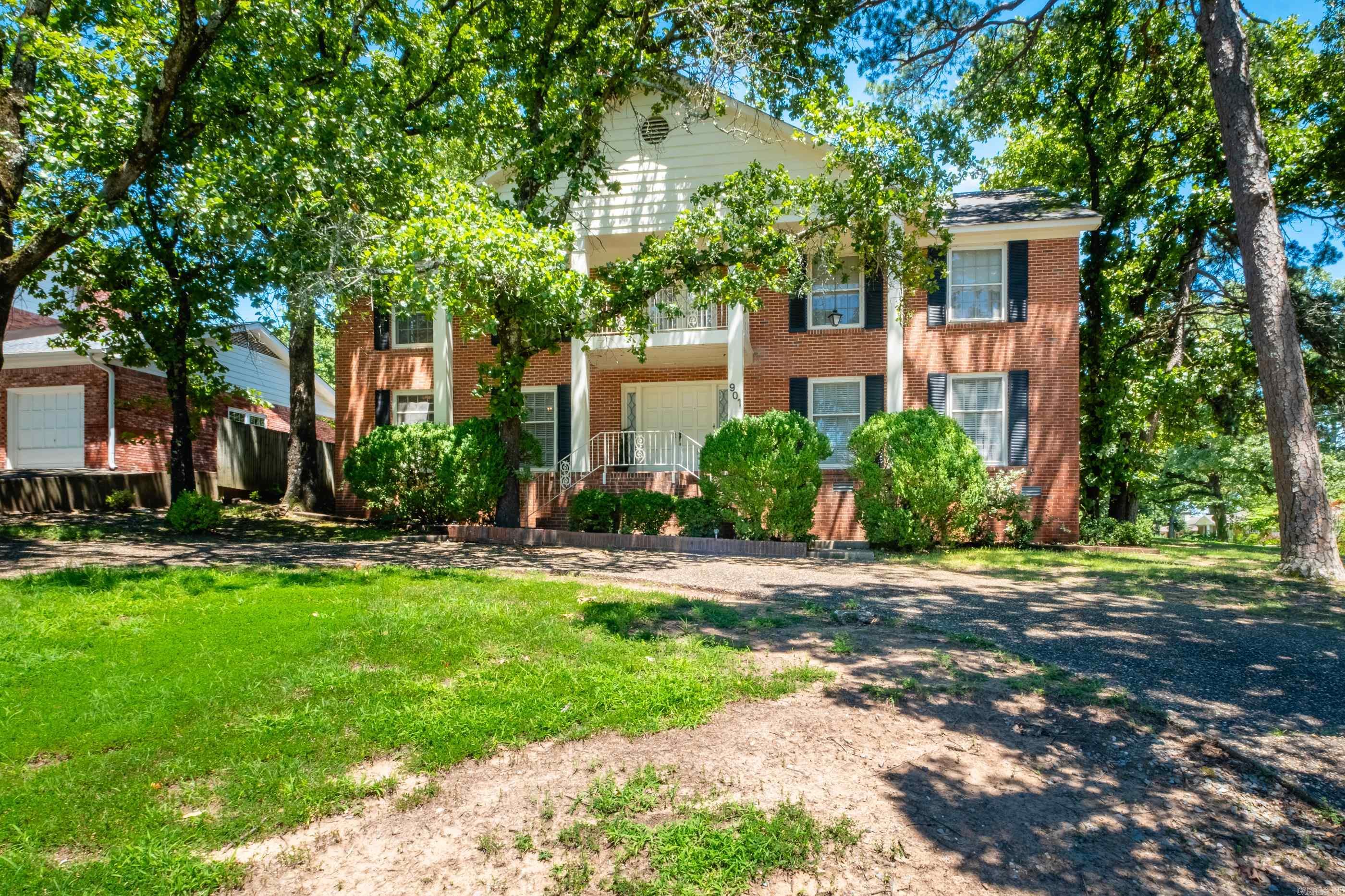 A blast from the past! For the first time ever, this meticulously maintained, corner lot, one-owner home is hitting the market! This property offers 6 bedrooms, 3.5 bathrooms, formal living and dining room, family room, sunroom, and an expansive bonus room upstairs. There is a two- car carport off of H St offering covered parking as well as a circle drive in the front. Whether you appreciate its classic charm or want to bring your own modern design ideas, the solid bones and wonderful layout offer unmatched potential. Schedule your tour today and see the potential for yourself! Agents, see remarks.
