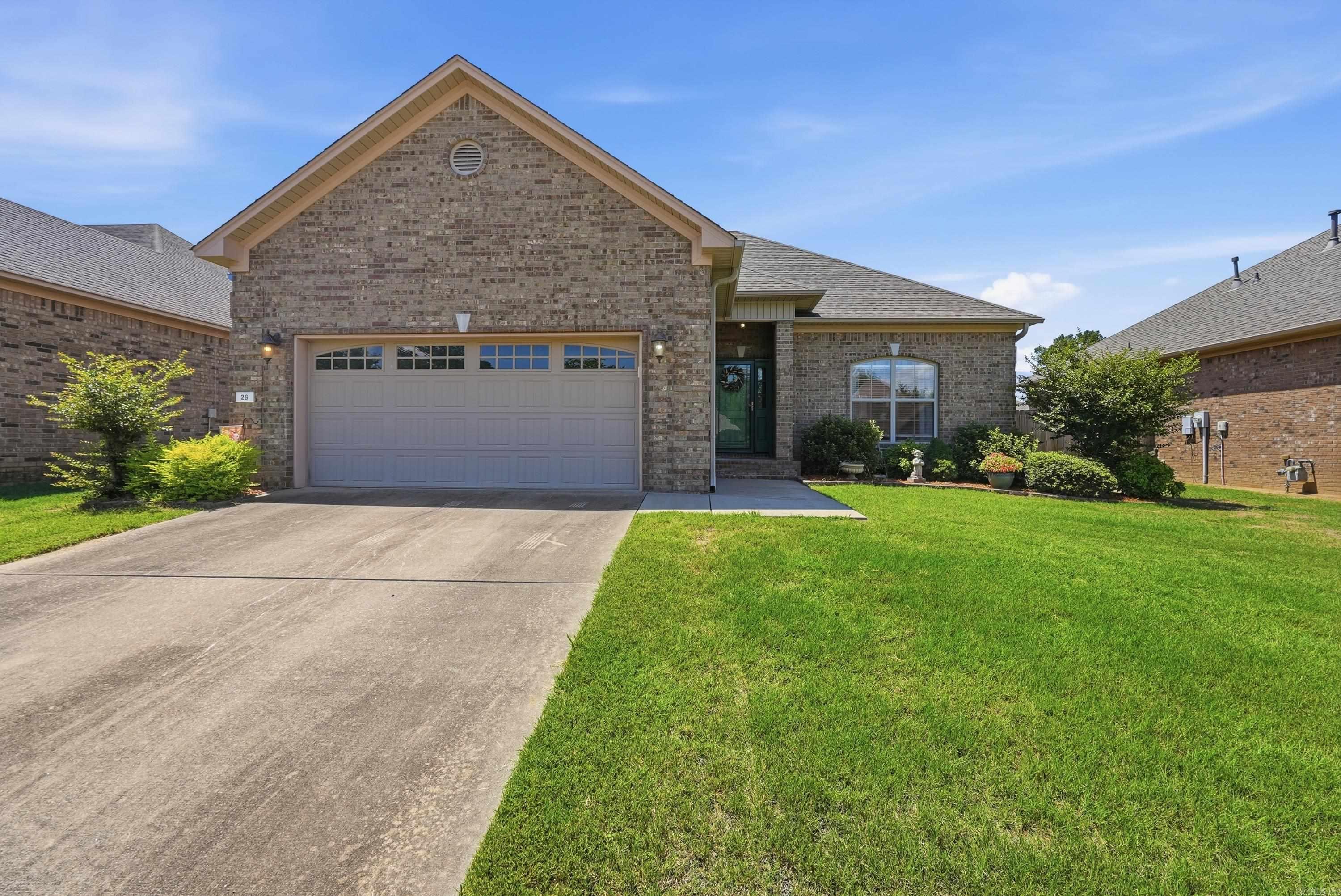 Welcome to 28 Oak Tree Circle! This spacious 3-bedroom, 2-bath home offers plenty of room to spread out and enjoy. Inside, you’ll find upgraded countertops, luxury vinyl flooring throughout, and a functional layout designed for comfortable everyday living. The well-maintained landscaping adds great curb appeal, while the fenced backyard with lush green grass creates the perfect space for relaxing, entertaining, or letting pets play. Conveniently located with easy access to I-40 and Highway 64, this home offers a quick commute to Conway, Little Rock, Beebe, or Cabot—making it a great option for those looking for both comfort and convenience!