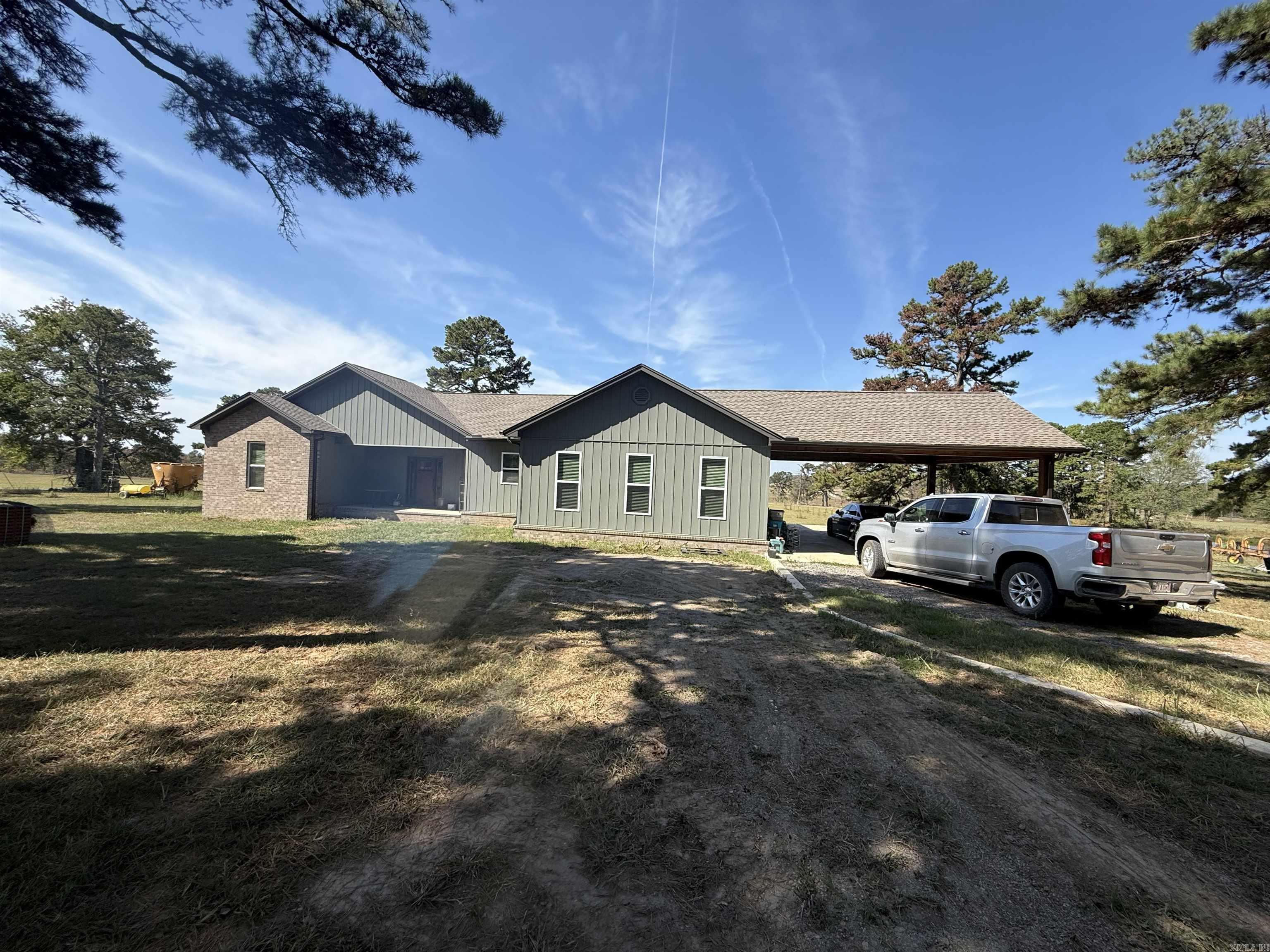 Escape to the peace and beauty of the countryside with this georgeous 158-acre farm-featuring a beauitful, new-custom 2,900 sq ft home designed for comfort and moderen living. If you've been dreaming of wide-open spaces, fresh air, and room to roam, this beautiful farm has it all!  Home Features:  * Spacious open-concept living room, kitchen, and dining area-perfect for family gatherings and entertaining *Versatile bonus room ideal for game room  or office *Safe room for peace of mind *3 bedrooms *2 1/2 bathrooms with high end finishes  Property Highlights:  *Commidity barn and shop-ideal for feed, equipment storage, and mechanicing *Underground springs flow througout the property, keeping the ground lush *Irrigation has possiblities here as well *5 ponds *158 acres of Rolling pastures for cattle, horses, and crops *It has a proven crop hisotry *over20 acres of ideal hunting property *fence line bunks, automatic water tanks, rational grazing/cattle pens   From sunrise over the pastures, to enjoying the porch at sunset, every moment here feels like a retreat! Wheather you are looking for a working farm or private getaway, this property delivers an unparalleled opportunity.