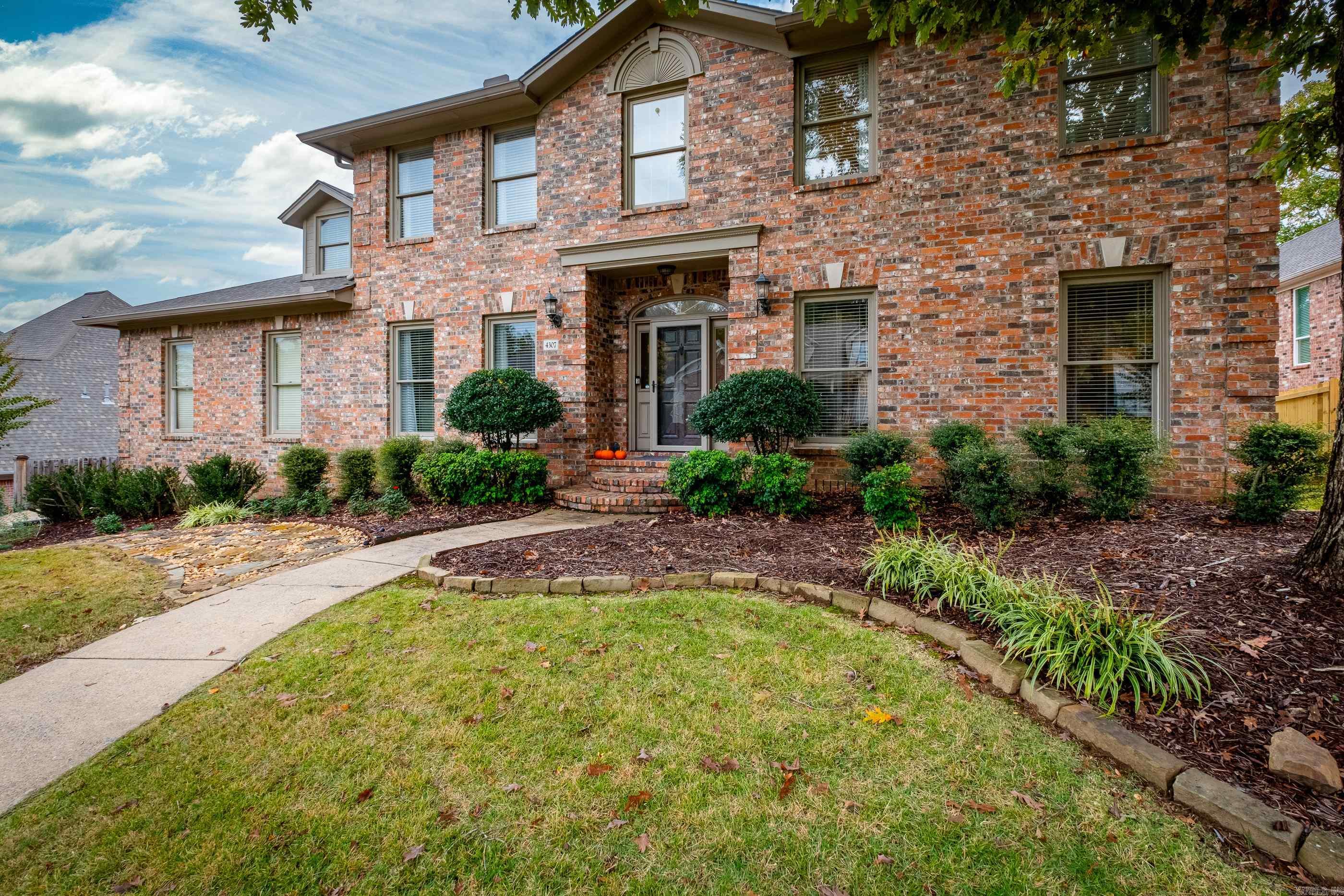 What a wonderful inviting home, nestled close to the cul-de-sac, on a lovely street in the heart of Little Rock. This property has been meticulously kept and updated to create a beautiful home.  The primary bedroom, with two walk in closets and en suite bath is on the main level. There is guest bedroom with full bath on the main level which would also be a great  office. The flexible floor plan allows for a fun pool table/game room, or a formal dining room adjacent to the kitchen. Upstairs are three very nicely sized bedrooms, two full baths and a playroom. The space in this home has been cleverly utilized and you will find great storage available. The swimming pool is heated for longer enjoyment. This location is so convenient, you will love it!