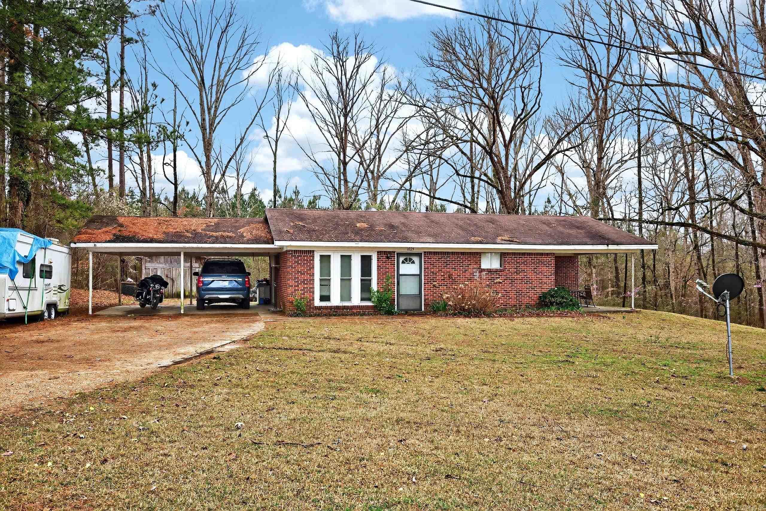 Great opportunity with plenty of potential! This property at 1029 Center Point Rd in Gurdon sits on approximately 1 acre of land and is conveniently located just minutes from the interstate, offering easy access for commuting while still enjoying a peaceful setting. The home is currently tenant occupied, making it a great option for investors looking for immediate rental income or buyers interested in a property with long-term potential. With its spacious lot and convenient location, this property offers many possibilities including rental investment, future improvements, or a personal residence with room to grow. Priced to sell, this is an opportunity you won’t want to miss.