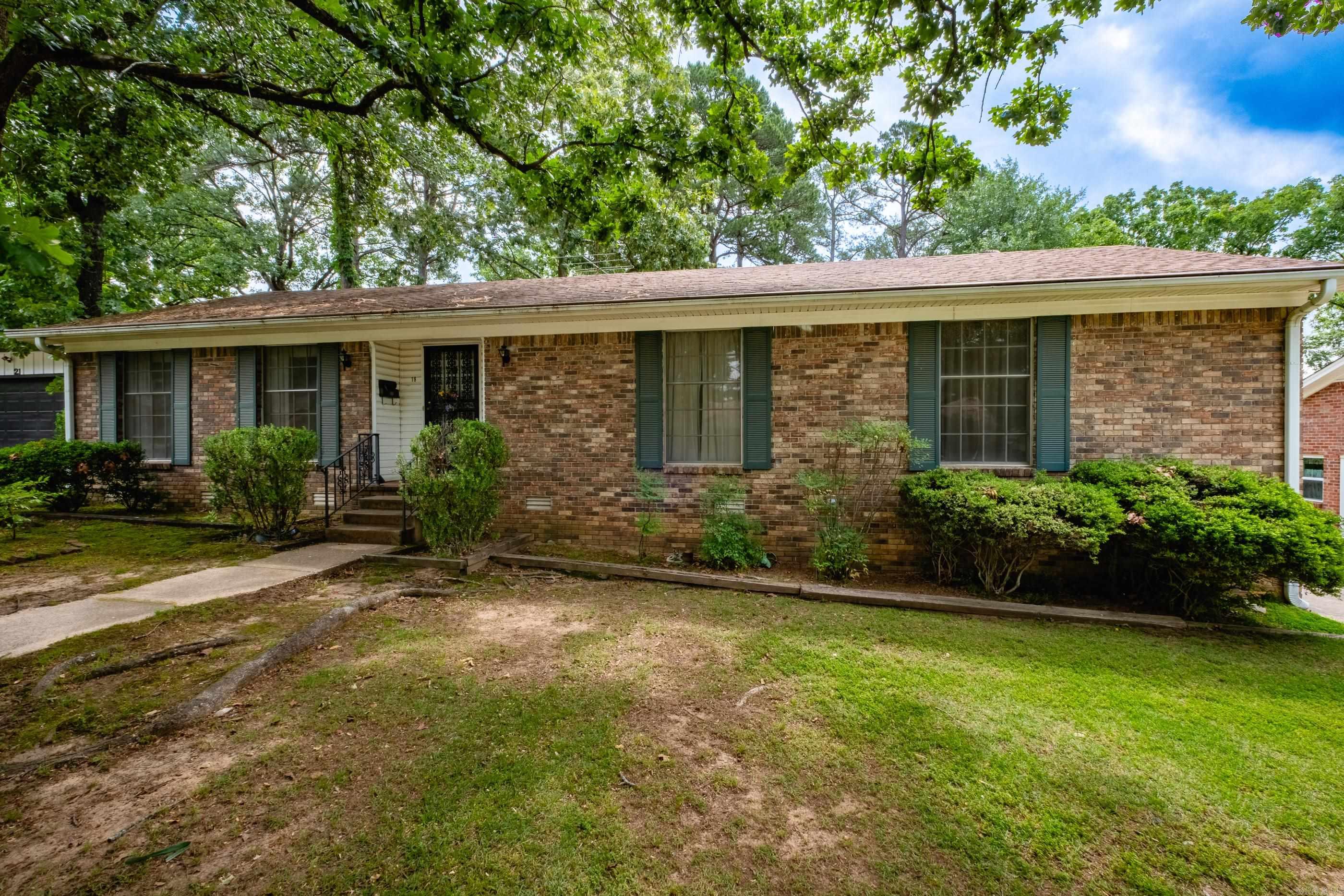 Investor special with endless potential.  This 3-bedroom, 2-bathroom home features a spacious layout with an eat-in kitchen, formal dining area, cozy fireplace, and two separate living areas offering plenty of flexibility for entertaining or future updates. Outside, the property includes a 2-car carport plus an additional parking pad for extra parking convenience.  Perfect opportunity for investors, flippers, or buyers looking to add value.  Property is being sold AS-IS and priced accordingly. With the right vision and improvements, this home could become a fantastic investment or rental property.