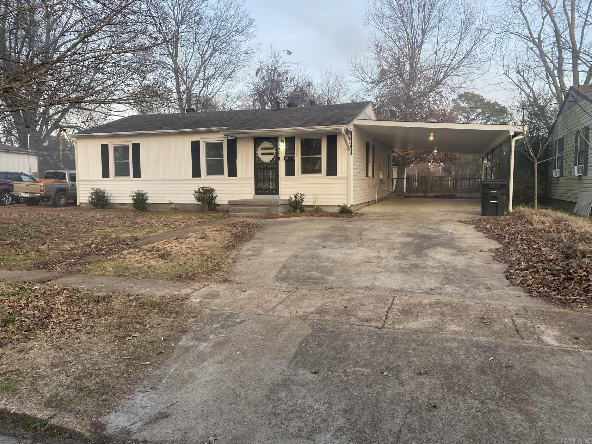 Remodeled 3 bedroom, 1 bath home with carport and shop. New windows, flooring, and appliances, including fridge. Shop with overhead door. A gas water heater, and gas central heat. Ceiling fans in all bedrooms. This home has vinyl siding, with architectural shingles.