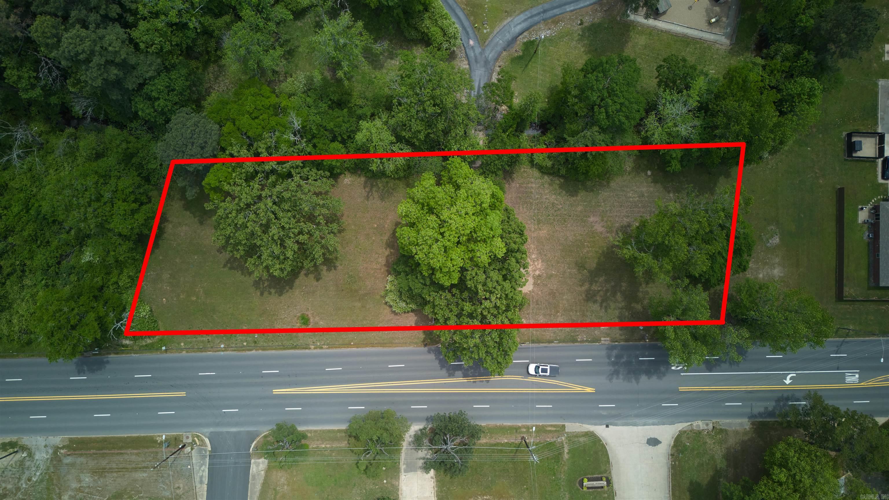 Highly Visible and Commercially Zoned C-3 across from Lakeside School District with McDonald's, Taco Bell, as well as many other international and local businesses in close proximity.