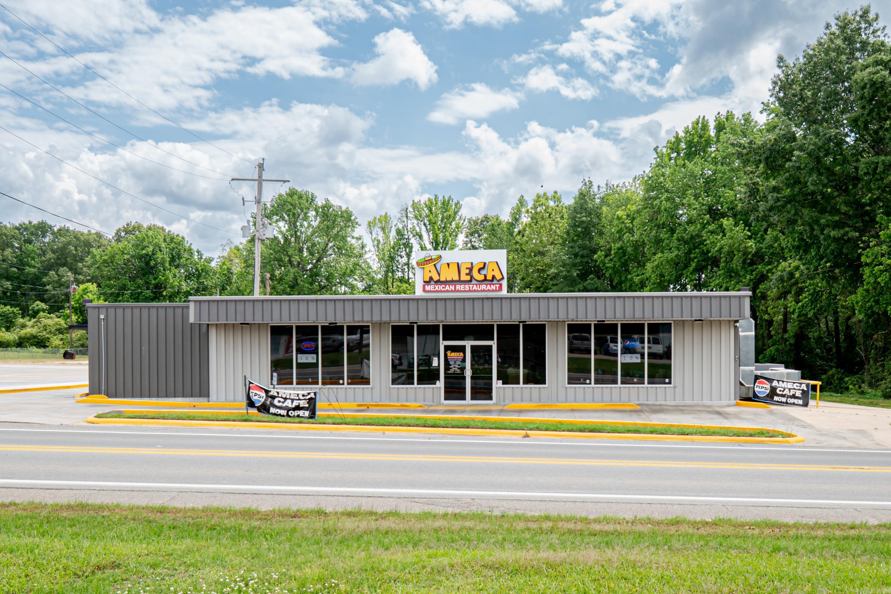 Beautiful 3,000 sq ft renovated restaurant situated on 2.5+- acres, plus two income-producing rental units available now. This completely updated restaurant space features new floors, drywall, paint, electrical, and HVAC, along with a brand-new industrial grill, walk-in cooler, ice box, refrigerators, and commercial dishwashers. A full security system is in place, and all restaurant equipment and furnishings convey, including prep stations, tables, and chairs. The property offers maximum available parking and is designed for dine-in, takeout, or delivery operations. In addition to the commercial space, the property includes two fully updated one-bedroom, one-bath residential units, perfect for staff housing or generating steady rental income. This is a rare opportunity to own a move-in-ready, income-generating property with everything in place for immediate operation on a spacious and versatile lot.