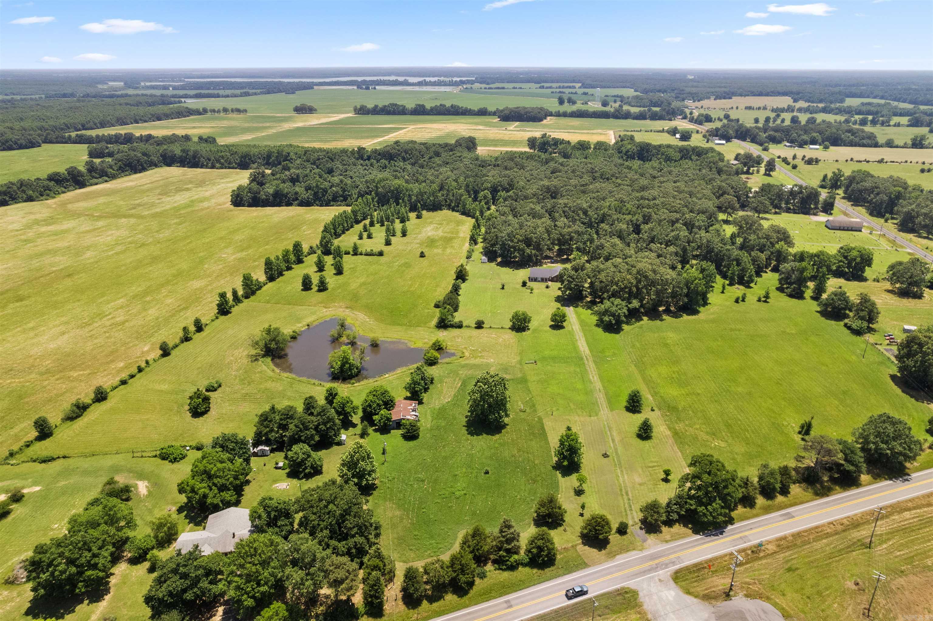 Welcome to your own slice of Arkansas countryside! Nestled on 41.88 picturesque acres in the community of Hickory Plains, AR (18 miles from Cabot and 14 miles from Beebe), this custom-built home offers the perfect blend of privacy, comfort, and wide-open space.  Built in 2006, this 2,014-square-foot home is surrounded by mature trees, open pasture, and scenic views in every direction. This property offers endless possibilities.   This home has a split plan with 2 car garage,  3 bedrooms, 2 baths, a safe room in the master closet, large laundry room with tons of storage and counter space, a gas fireplace, and much more. You must see to appreciate!   The expansive acreage provides plenty of room for livestock, outdoor recreation, gardening, future improvements, or enjoying the natural beauty, yet is still an easy commute to larger towns like Cabot or Beebe, or interstate 40 access (15 miles).   Professional photos and videos will be posted next week. Call or text to schedule an appointment today! Agents, you may also use ShowingTime to schedule appointments.  *updated with picture of new stainless steel range on 6/15/29*