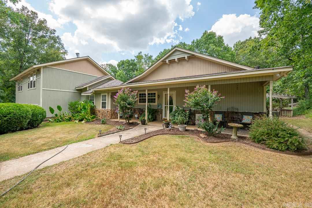 Very secluded home with approx. 31.45 acres. This home has over 4400SF, Master bedroom is on main level and has a fireplace. Huge game room, in-ground swimming pool, also a pond on the property. You will be in your own private paradise. This is definitely a treat for the nature lover.