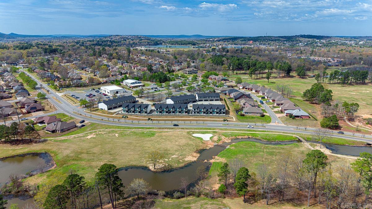 Exceptional opportunity to acquire a 24-unit condo portfolio in the highly desirable Country Club area of Maumelle. Located at 225 Country Club Parkway, this package includes well-maintained, townhome-style units with strong in-place rental income and excellent curb appeal. Interior units are currently rented at $2,200 per month and corner units at $2,300 per month, offering immediate cash flow with additional upside through stabilization. The property is currently 22 of 24 units occupied. Rare chance to purchase an entire income-producing residential portfolio in one of Central Arkansas’s most attractive submarkets. Convenient access to shopping, dining, recreation, and major thoroughfares. Ideal for investors seeking scale, location, and long-term income potential.