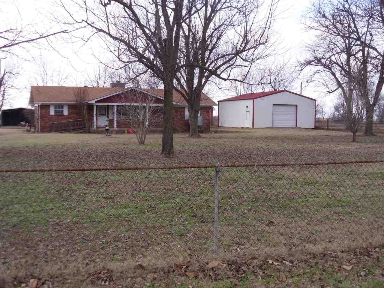 Three bedroom brick home on approximately three acres.  To be sold "as is".