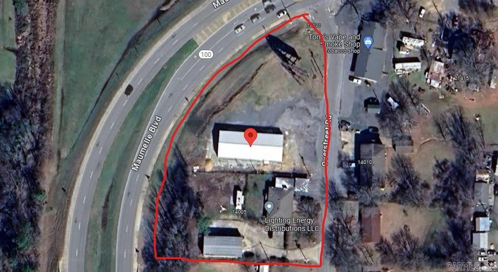 Great commercial investment opportunity.  1.2 total acres over 2 parcels.  Includes 4000 sf building built in 2023, 1700 sf home and 1500 sf warehouse.  Located at heavy traffic intersection of Hwy 100 (Maumelle Blvd) & Hwy 365 (Old Conway Highway), just .5 mile from Interstate 40.  Approximately 23,000 cars per day. Many retail and hotel establishments nearby. Just outside city limits of Maumelle, one of Arkansas' richest, safest and fastest growing cities, with 20,000 population.  See agent remarks.