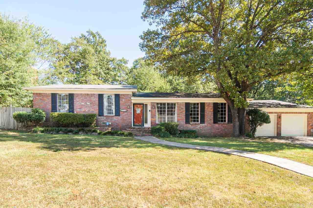 Wonderful home for sale in the heart of Midtown. Two large living rooms, one with an awesome fireplace. Ideal for family living. Two car garage. Private courtyard, perfect for gardening. Large bright kitchen w/ lots of cabinet & countertop space. Hardwood floors & abundant natural light throughout. Large, private back yard. Nice bathrooms. Full brick. One story. Huge laundry room. Super clean & well maintained. Only minutes from shopping, dining, grocery, & the interstate. AGENTS SEE REMARKS!