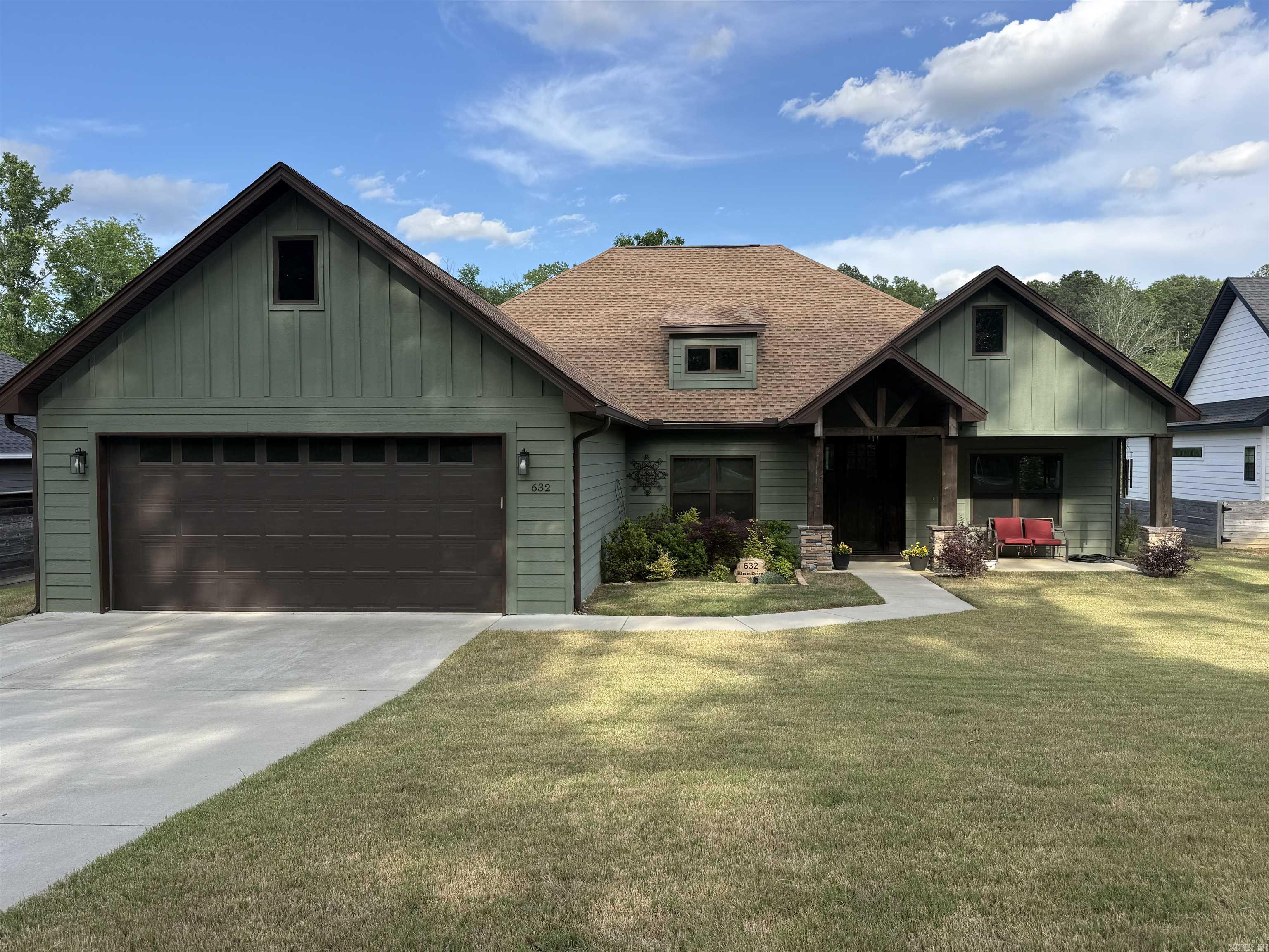 Beautiful newer construction home located right on the Benton/Bauxite border in a small, peaceful subdivision. This stunning home features granite countertops throughout, a large farmhouse sink, and an open-concept living, kitchen, and dining area. The primary suite offers a luxurious bathroom with a tub, separate shower, dual vanities, and a spacious walk-in closet. Split bedrooms, LVP flooring throughout, a large pantry, and thoughtful built-in shelving in the closets, laundry, and living areas add both comfort and convenience. A mudroom/laundry room just off the garage makes daily living easy.  Outside, enjoy a covered patio with beautiful lake views, green space both in front and behind the home, and an extra-wide driveway with plenty of parking. Additional storage includes a huge floored attic with stairwell access and an exterior double-door storage closet perfect for lawn equipment and tools. The neighborhood also offers fiber optic internet. This home checks all the boxes AND qualifies for $0 down for qualified buyers and is available for easy Go and Show. Don’t miss this move-in ready gem!