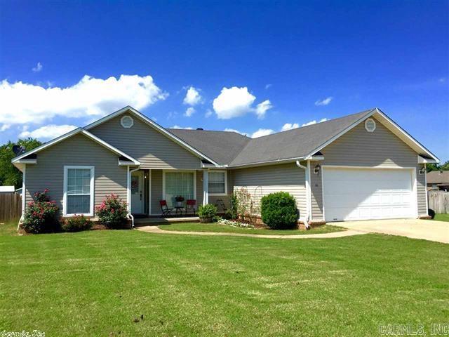 Beautiful well maintained home nestled on a large lot in the sought after Woodbridge Subdivision! Extra landscaping invite you in to this open floor plan home with vaulted ceilings. Large Master bedroom with HUGE walk in closet, his and her vanities in master bath with jetted tub and separate toilet room. Large guest bath and large closets in each guest bedroom. Separate laundry room with storage throughout the house. 2 car garage with extra cabinet/counter space. HUGE back yard! Pet deposit non refundable.