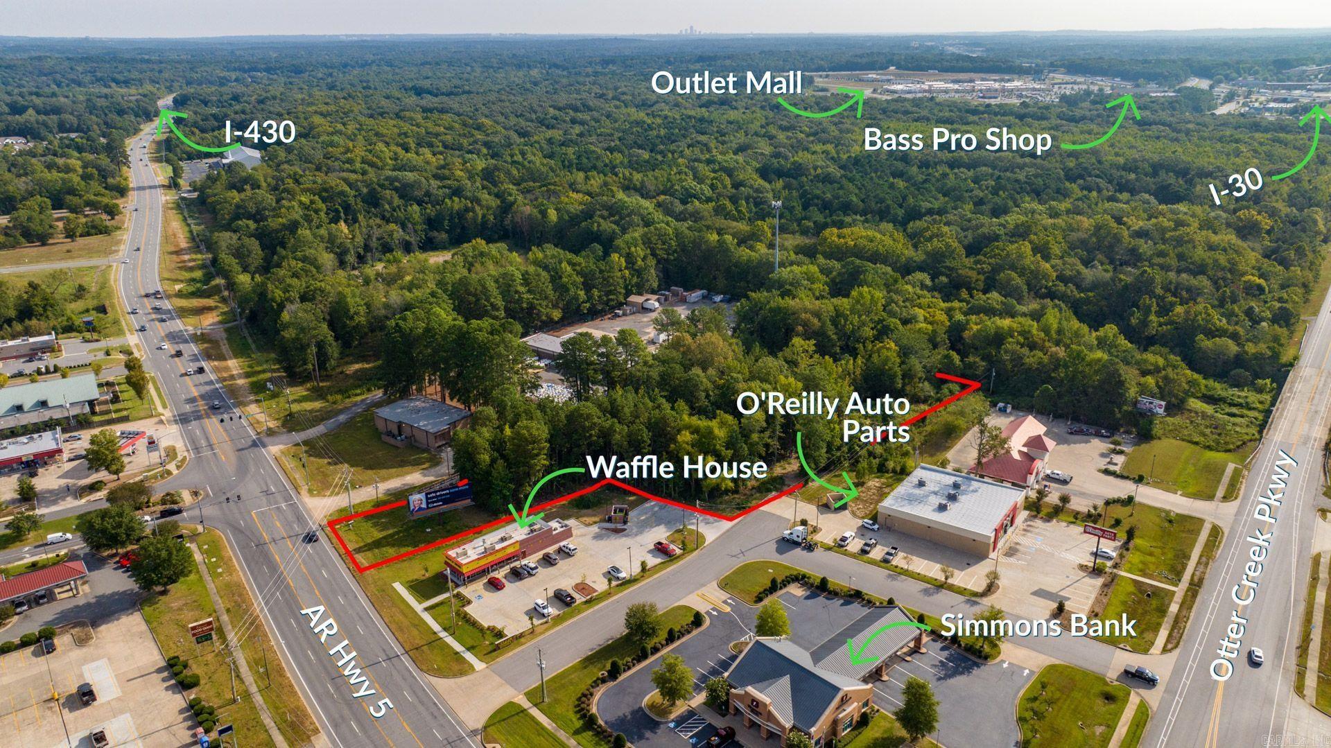 2.6 acres less than a minute to interstate 30!! Great location directly on Highway 5 in busy high traffic area. This 2.6 acres is flat and ready for commercial development. Easy access to both Interstate 30 & Interstate 430. The last car count was done in 2022 with an average of over 19,000 vehicles per day.