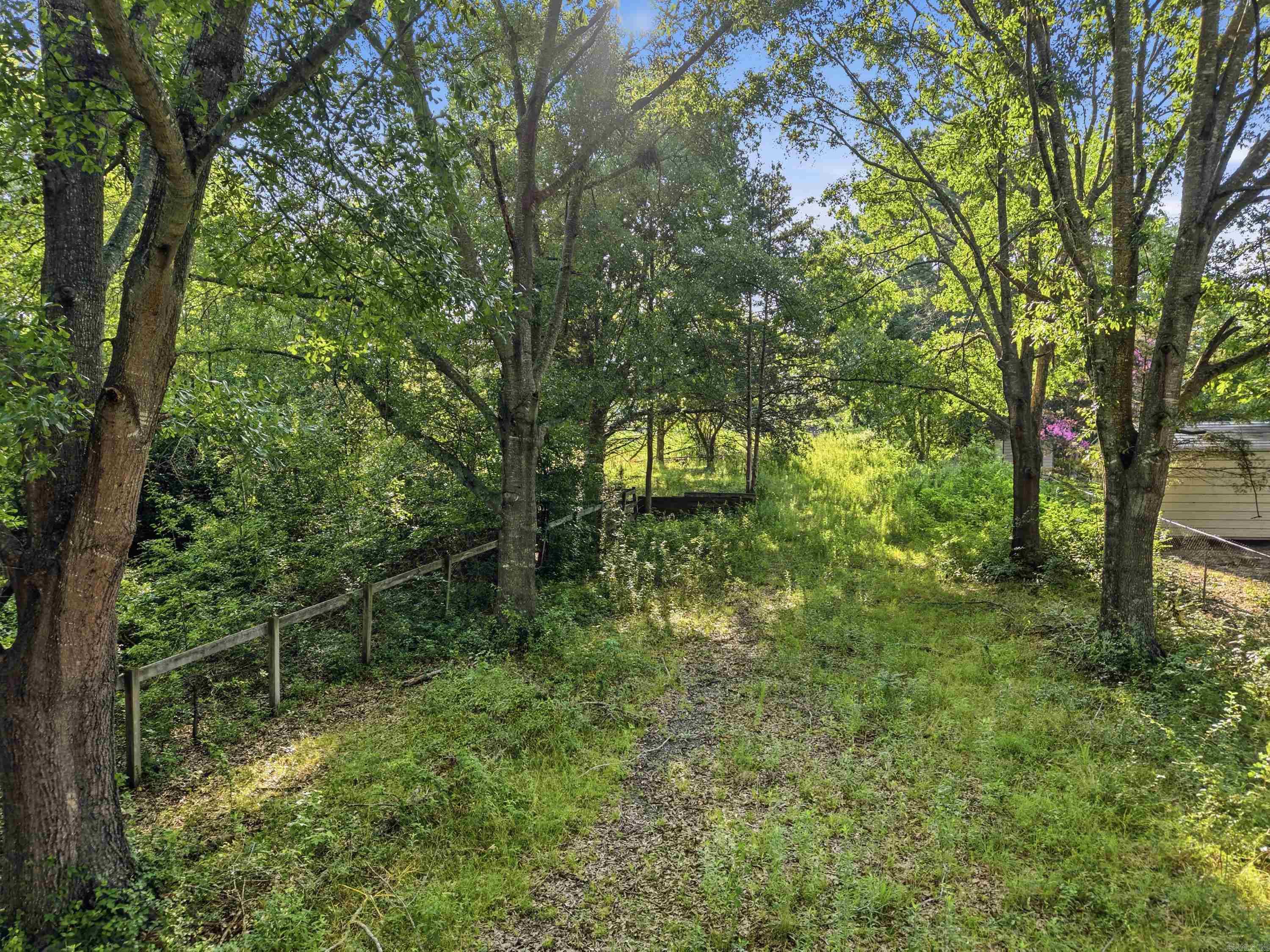 This 16.30 acre lot would be perfect for a custom home or for an investor wanting to develop a new housing development. Property has a pond for fishing, wildlife for hunting and partial fencing. Property had mobile homes for rent in the past so utilities are onsite and ready. Call today for a tour and a chance to make this property yours!!-- See agent remarks