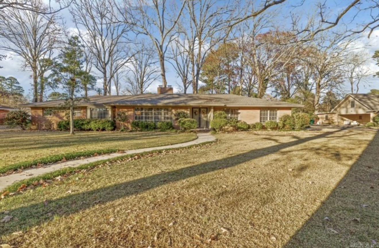 Welcome to this beautifully updated 3 bedroom, 2 bath home that perfectly blends comfort, charm, and functionality. Located near the hospital in a coveted neighborhood, this home is conveniently close to shopping, restaurants, and the casino, making it an ideal location for both convenience and lifestyle. It is situated on a 0.76-acre lot that provides plenty of space to relax and enjoy the outdoors. Inside, the home features beautiful flooring and tasteful updates throughout, creating a warm and inviting atmosphere. The large living room offers the perfect gathering space and includes a cozy wood-burning fireplace, ideal for relaxing evenings and a gas log fireplace in living room.  The spacious master suite provides a comfortable private retreat with ample room to unwind. The additional bedrooms are also generously sized with plenty of space for family, guests, or a home office. The kitchen is both stylish and functional, featuring an eat-in dining area, a convenient bar for additional seating, a gas cookstove, and updated appliances perfect for preparing meals and entertaining. The beautiful dining room provides an elegant setting for family dinners or hosting guests. Must See!