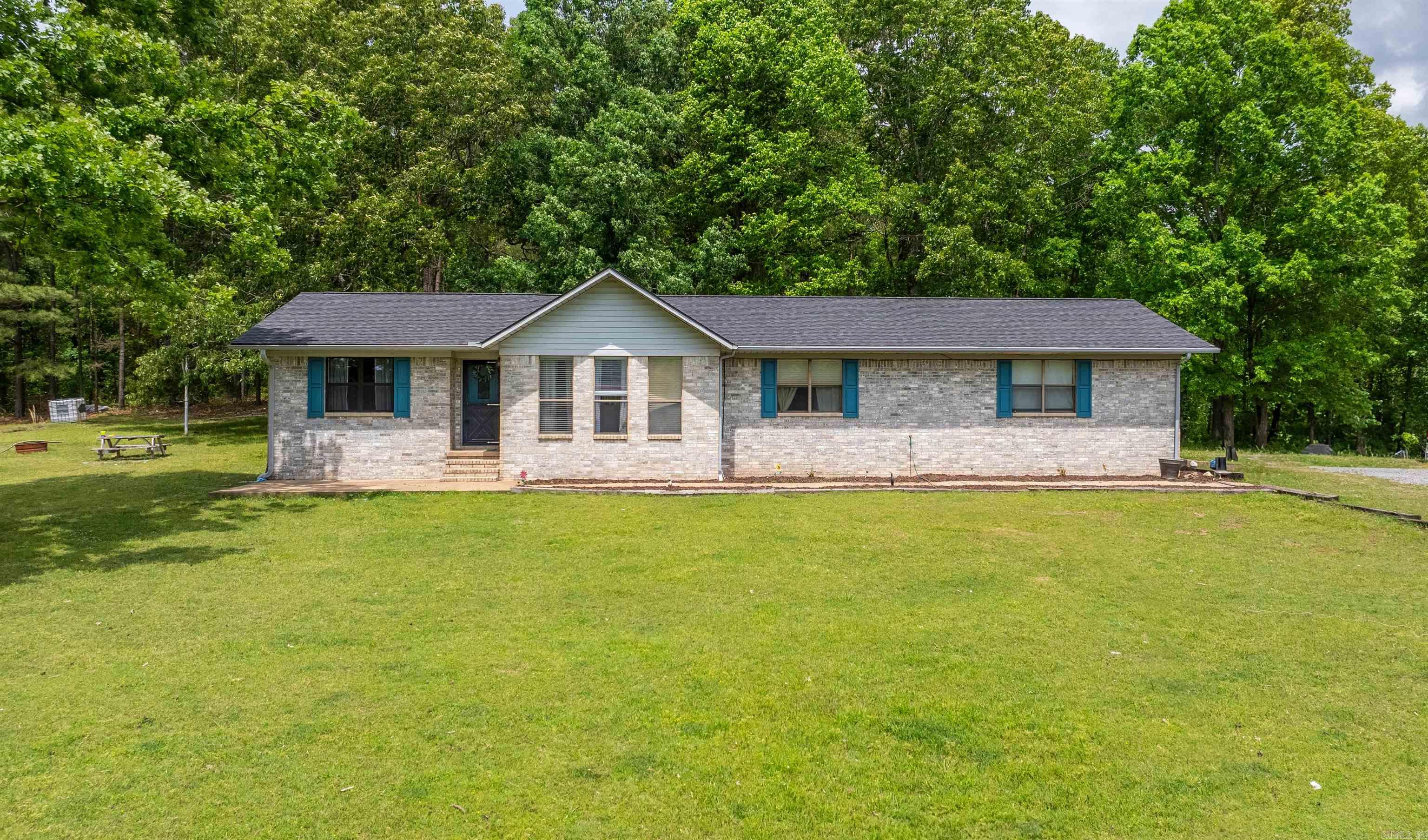 What if your next home came with enough land to hunt, ride ATVs, raise animals, start a hobby farm, or simply enjoy the peace and quiet of country living? This ranch-style home sits on 38 beautiful acres and offers 3 bedrooms, 2 bathrooms, and the kind of space that's becoming harder to find. Inside, you'll find comfortable living areas designed for everyday life, while outside the possibilities are endless. Need room for projects, equipment, or a business? The large hobby shop provides plenty of space to work and create. Above the shop, you'll find a full apartment--perfect for guests, extended family, rental income, or a private home office. Whether you're dreaming of a self-sufficient lifestyle, a recreational retreat, or simply a place where the neighbors aren't on top of you,  this property delivers.  Land. Privacy. Flexibility. Opportunity.  Properties like this don't come around often--schedule your showing and see what 38 acres of freedom looks like.