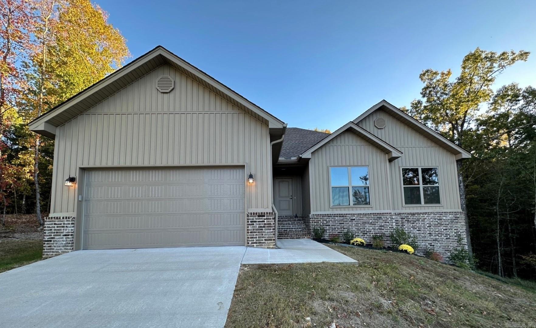 Seller allowing $7,500 for buyer closing or financing options. New Construction in Pinewood Estates. Living area has 10' ceiling , wood burning fireplace & is open to kitchen & dining. Kitchen has custom cabinets w/ez-close drawers, granite counter-tops & s/s appliances. Crown molding in all rooms. Hardwood floors in LR, kitchen, dining, & hall. Ceramic tile floors in baths & laundry. Split floor plan. Primary BR has tray ceiling. Primary bath has sep. shower, soaker tub, & large closets. Laundry room w/storage. Approx 0.81 acre lot. Possible storage in Crawl space. Bryant Schools. AT&T Uverse available at street & Connect2First internet options.   AGENTS SEE REMARKS!