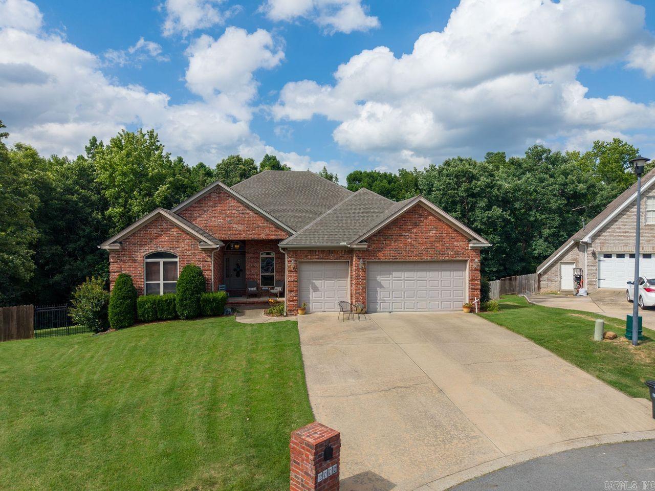 Here's your chance to land a Wonderful Glenn Hills Addition home on a low traffic cul-de-sac street! $374,900. 4 bedroom 2.5 baths with Just under 2400sq ft.  Oversized 3 car garage with tons of added storage. Huge walk in partially finished basement with Tons of potential. Open living/dining and partially open kitchen. Separate breakfast area. Granite counters, slide in gas range, over the range mw, dishwasher, Large laundry room with abundant storage. Split bedroom floor plan, Large primary suite with tray ceiling. Covered back deck with lower patio, rod iron fenced, views of Indianhead lake. Just minutes from LRAFB as well as downtown LR. HVAC replaced in March 2026.  Seller paying $750 of buyer's first year home warranty.  Ready for your new chapter!