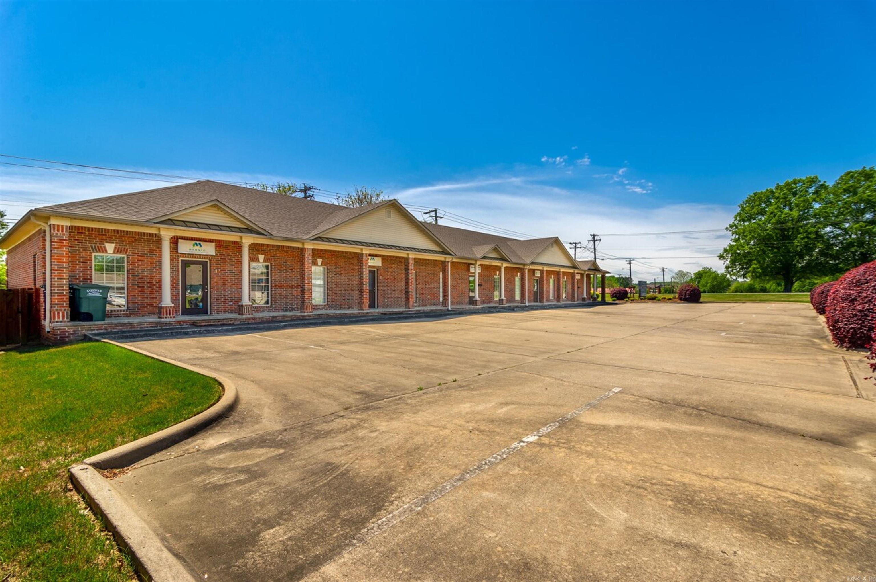 Fully occupied office investment property located at the signalized intersection of College Avenue and Hogan Lane in Conway, Arkansas. The property benefits from exceptional visibility, prominent monument signage, and exposure to approximately 28,000 vehicles per day. Situated within one of Conway’s most established and rapidly expanding office, medical, and residential corridors, the site offers strong long-term investment fundamentals.  The property is less than two miles from major destinations including the University of Central Arkansas, Conway Country Club, and Centennial Valley Golf Club, and approximately four miles from Interstate 40, which carries more than 92,000 vehicles daily. Surrounding amenities include Walmart Supercenter, Dollar General, Zaxby’s, Wendy’s, and numerous retail and service providers that support the area’s growing population.  Additionally, the property is located near the campuses of the University of Central Arkansas, Hendrix College, and Central Baptist College, providing access to a large base of students, faculty, and staff. Conway continues to experience significant growth, with its population increasing by approximately 12.7% since 2020, addin