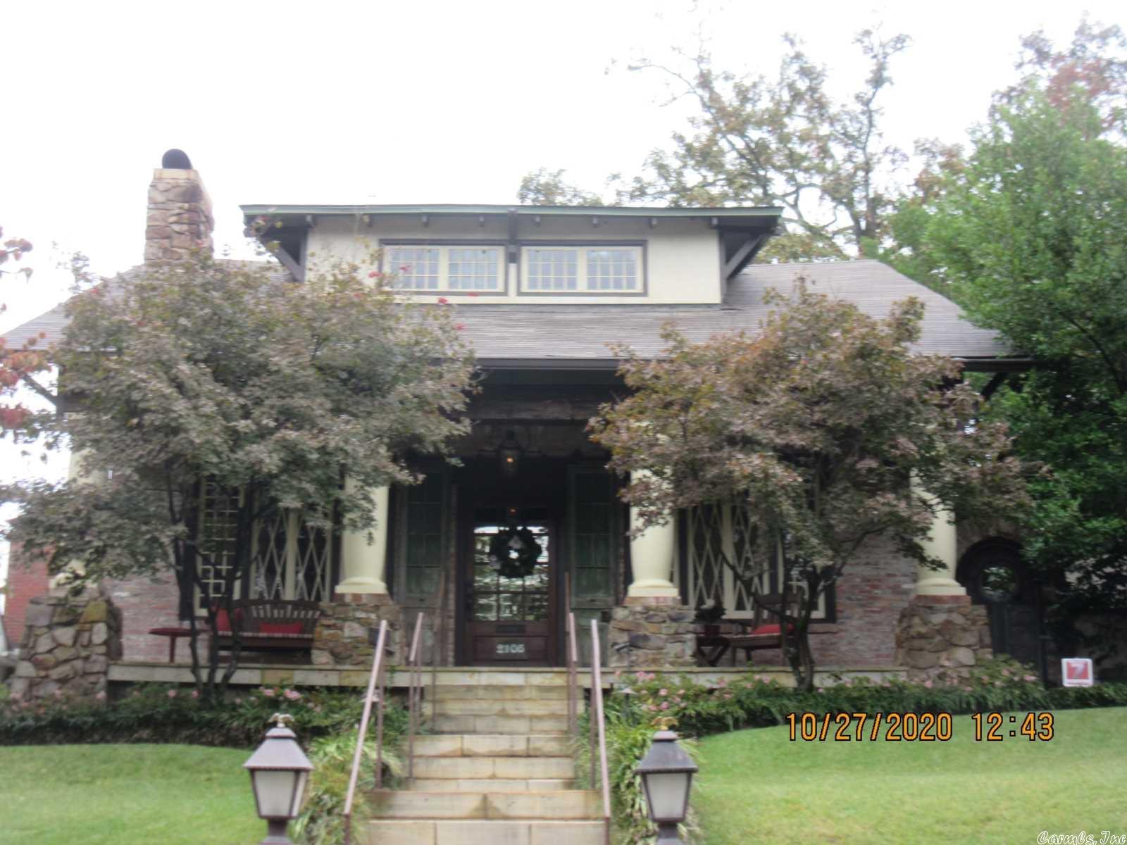 Loaded with charm and character. Handsome entry and living.  Opens into kitchen and family living overlooking private terrace and grounds. Main level with primary suite and bath with steam shower and heated floor, library, great room, bar.  3 fireplaces, 1/2 bath, dining.  3 BR 2 BA up, tankless water heater, generator. Rear load covered parking. Easy walk to CCLR