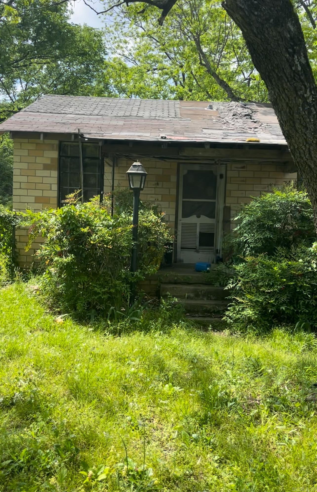 Investor special! Prime Opportunity in Established Neighborhood - This 1-bedroom, 1-bath fixer-upper offers 600 sq ft of potential in a well-established neighborhood. Though in need of significant restoration, this property features a charming front porch, making it an ideal project for investors or savvy buyers looking to bring new life to a classic home. Whether you're looking to renovate and resell or build long-term rental income, this is your chance to create value in a desirable location at a reasonable price. Agents see confidential remarks. Square footage and lot size approximate please measure.