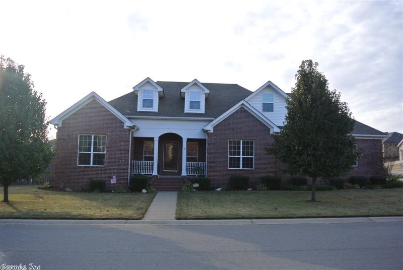 BRYANT SCHOOLS! Beautiful home on a large corner lot, with side-load garage. This 4 BR split plan has hardwoods in MBR, MB has 2 vanities, a whirlpool tub and tiled shower.  Kitchen has tiled floors, granite, SS appliances.  The upstairs BR could be used as bonus room/sewing room/office. Nice deck in back that has a bench around it, and a remote-controlled awning.  There's a concrete  pad behind fence for an RV or boat. Sprinkler system in front of house AND in back! Home has gutters and is fully fenced.!!