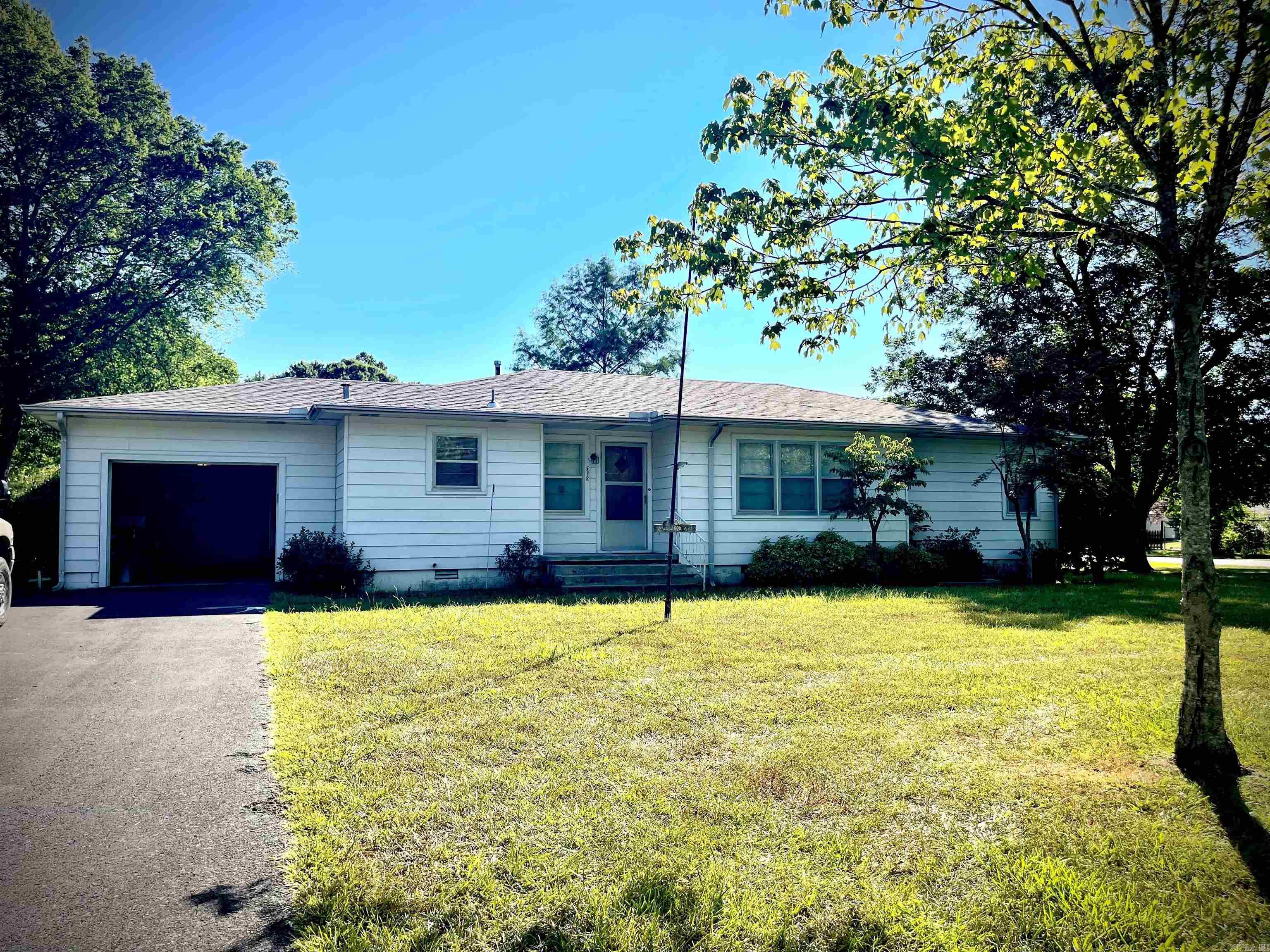 Great 2BR/2BA home with original hardwood floors, nice, spacious kitchen, great room and separate living room that could be converted to 3rd bedroom.  Storage building and additional carport add to the value of this beautiful property with large lot & mature shade trees. HVAC replaced in 2019 and new Roof in 2022