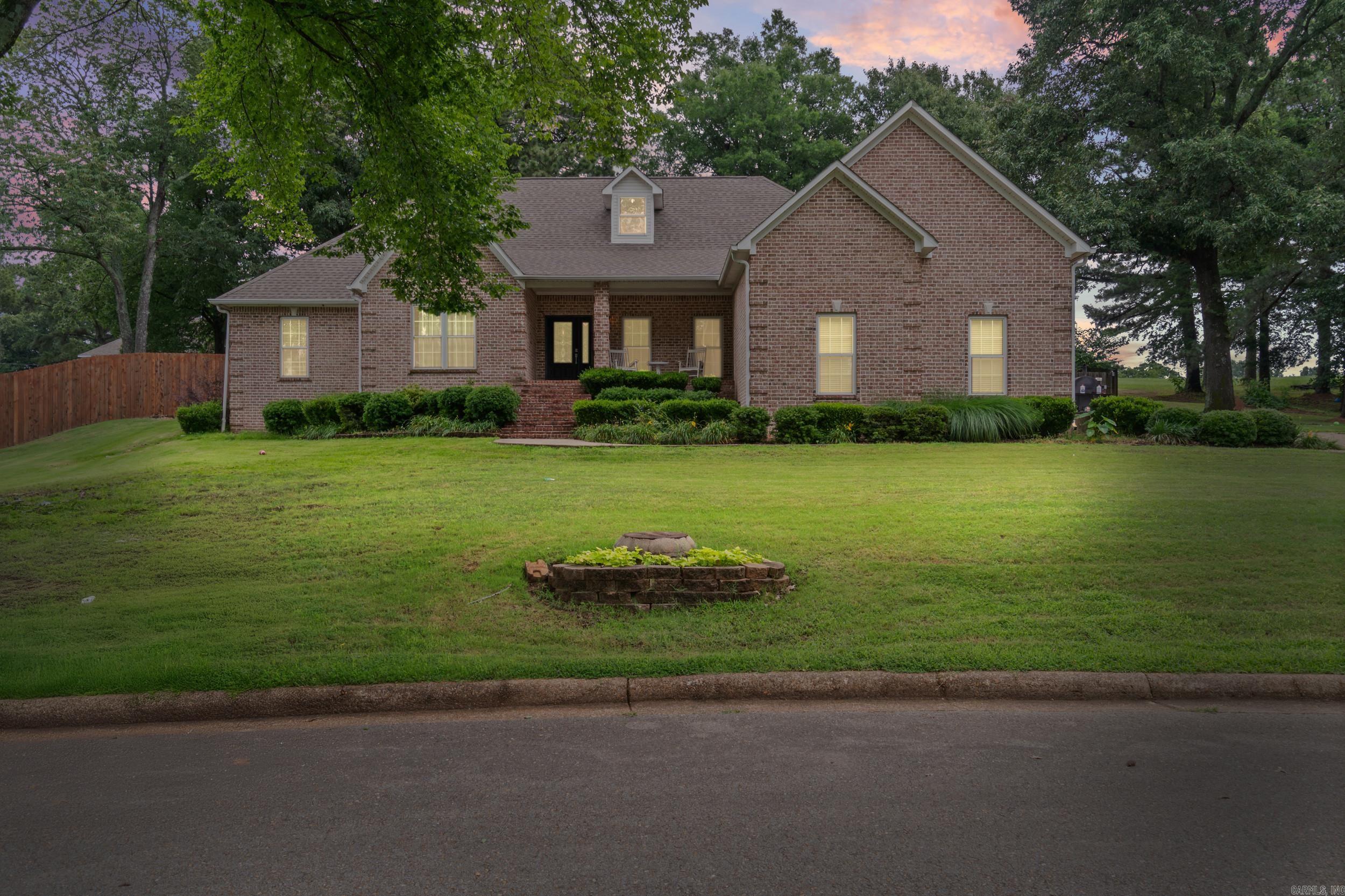 Welcome home to this spacious and beautifully designed 4-bedroom, 3-bathroom residence offering the perfect blend of comfort and functionality. The impressive living room features soaring ceilings and a stunning stone fireplace, creating a warm and inviting focal point for family gatherings and entertaining.  The thoughtfully designed floor plan includes a formal dining room, ideal for hosting holidays and special occasions, along with a convenient 2-car garage. The expansive primary suite is a true retreat, featuring an attached office or nursery that provides flexibility for your family's needs. You'll also love the generous his-and-hers closets and private bath.  Storage is abundant throughout the home with large closets in every bedroom and ample space for organization. Whether you're looking for room to grow, work from home, or simply enjoy everyday living, this home offers the space, comfort, and versatility you've been searching for.