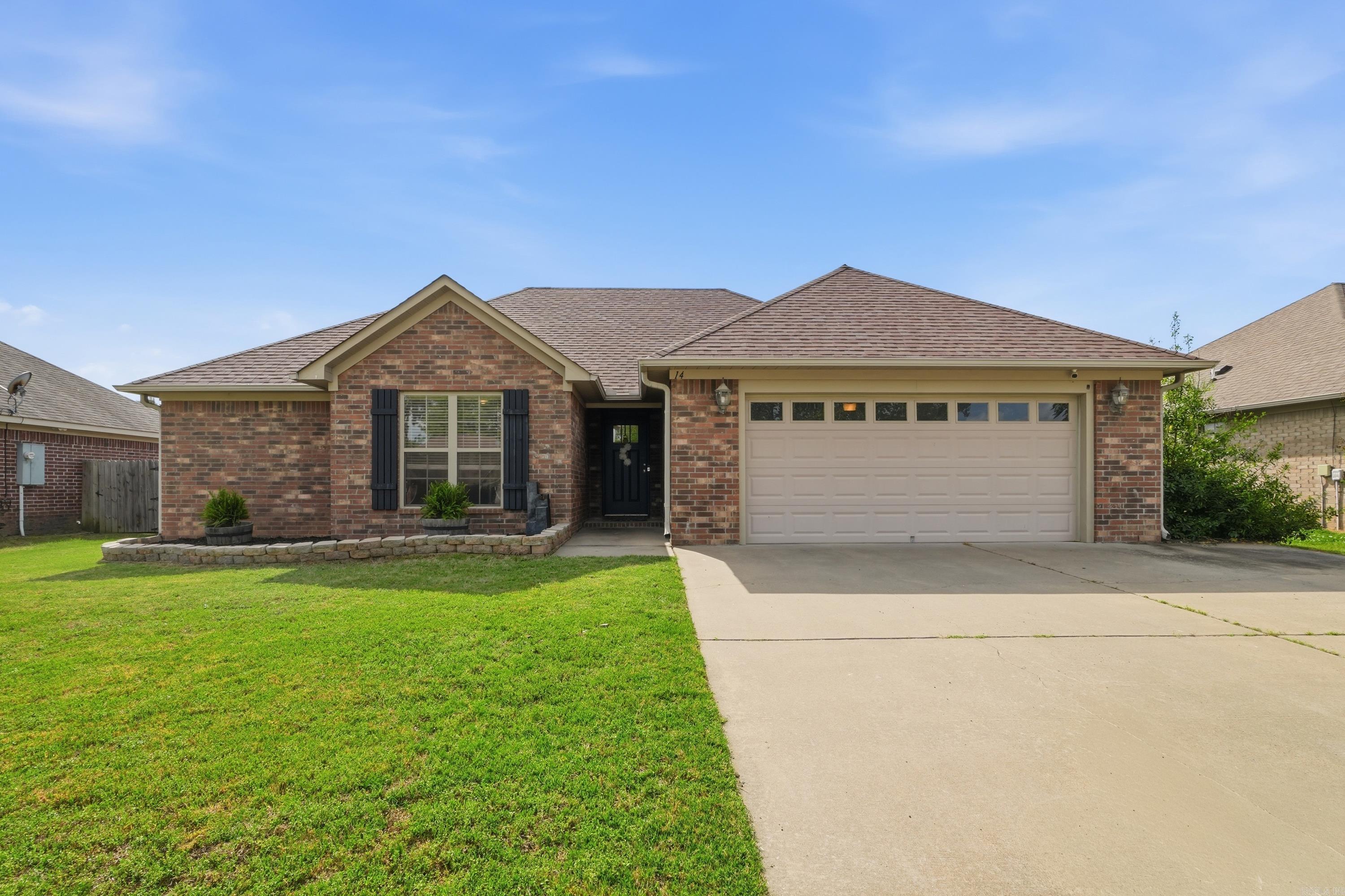 Charming all-brick home with great curb appeal and a functional, inviting layout! Step inside to an open living, dining, and kitchen space filled with natural light, accent paint details, and updated light fixtures that add a modern touch throughout. The kitchen features granite countertops, a stylish new backsplash, stainless appliances, bar seating and a pantry—perfect for everyday living or entertaining. The spacious primary suite offers comfort and convenience, highlighted by a huge walk-in closet with built-ins for organized storage. Additional bedrooms provide flexibility for guests, a home office, or hobbies. Out back, enjoy a private, fenced yard with a patio area ideal for relaxing or hosting. With thoughtful updates and move-in ready condition, this home checks all the boxes!